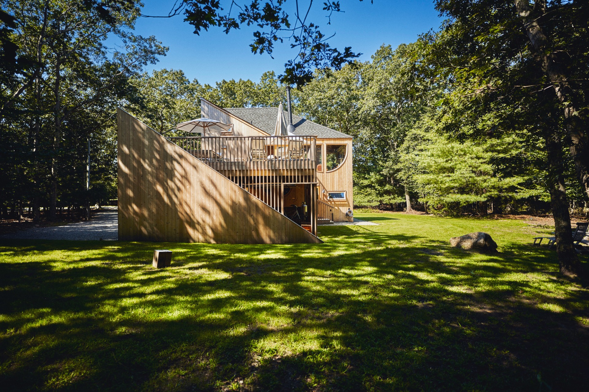 23 Neck Path East Hampton, NY 11937 - Photo 29 of 33 a backyard of a house with lots of green space