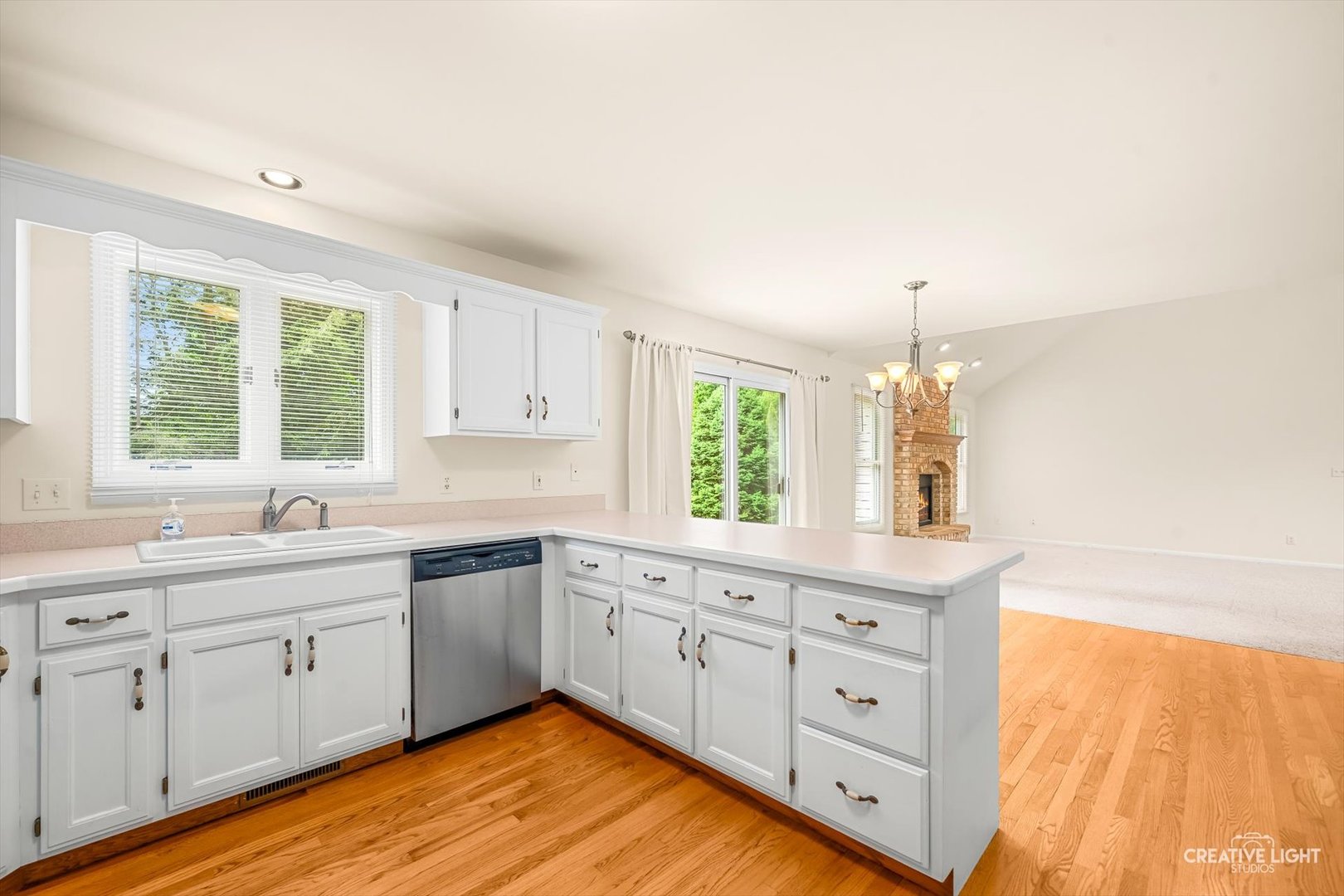714 East Knights Road Sandwich, IL 60548 - Photo 8 of 33 a large white kitchen with a large window