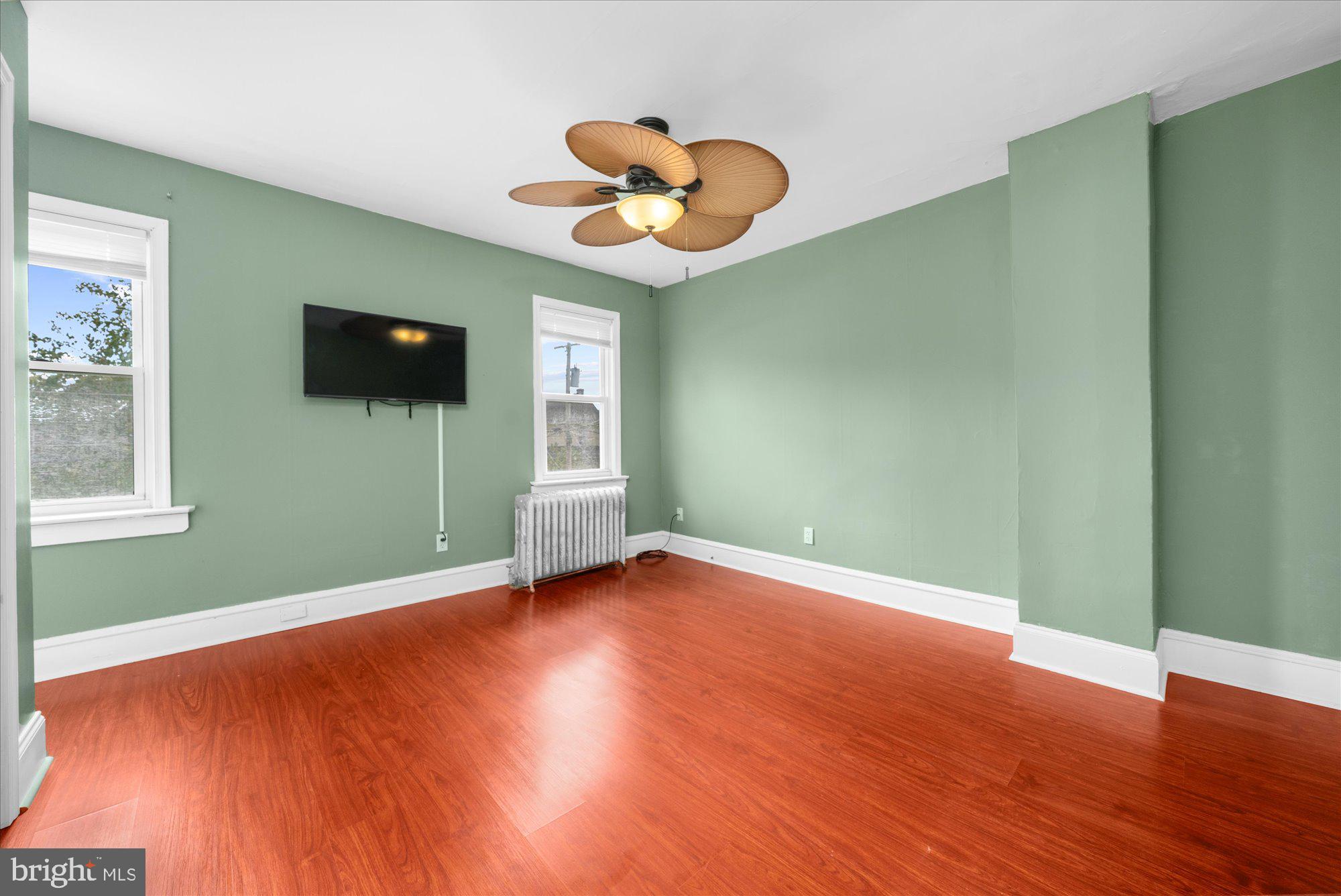 120 Linden Avenue Glenside, PA 19038 - Photo 11 of 28 a view of empty room with wooden floor and fan