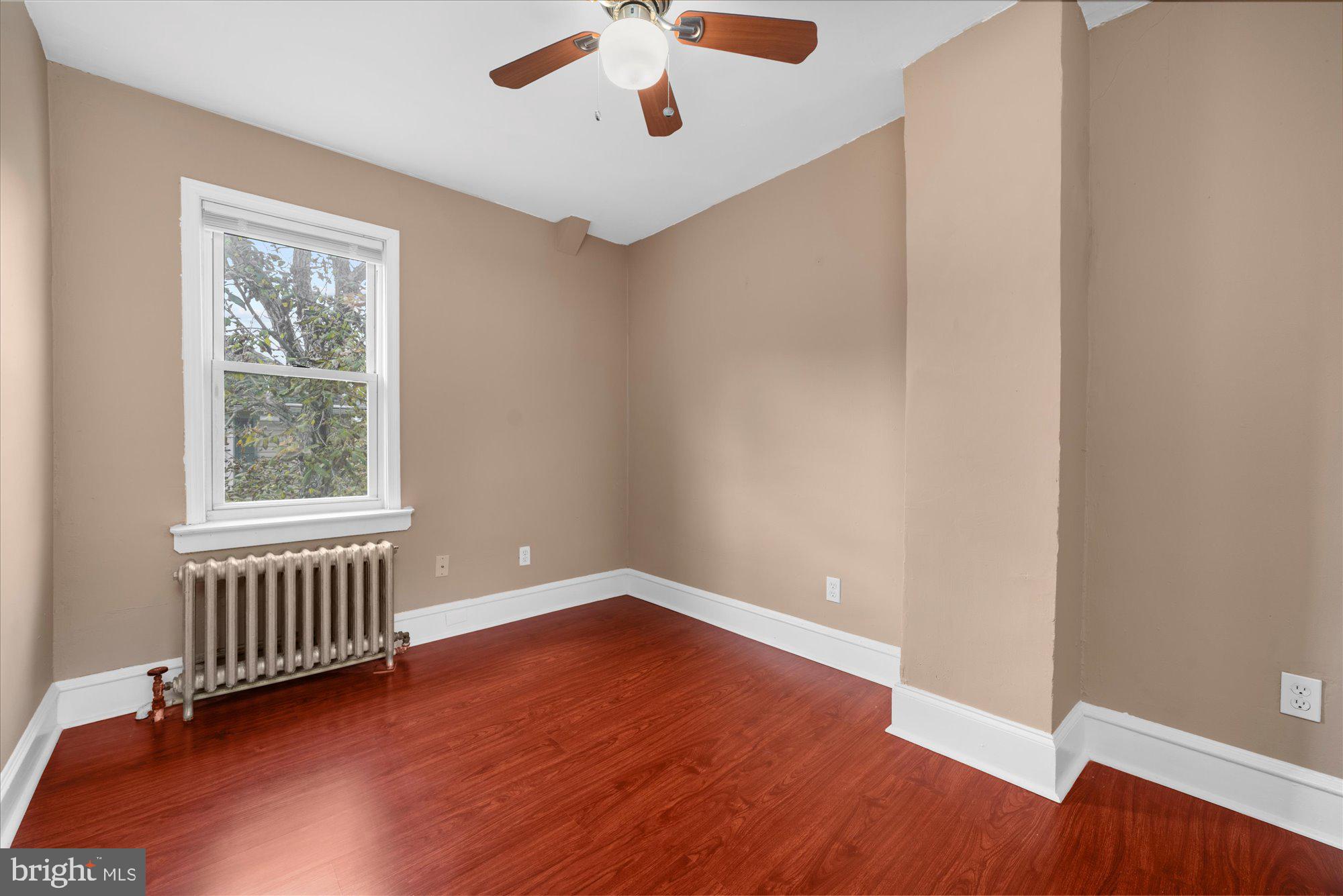 120 Linden Avenue Glenside, PA 19038 - Photo 14 of 28 wooden floor in an empty room with a window