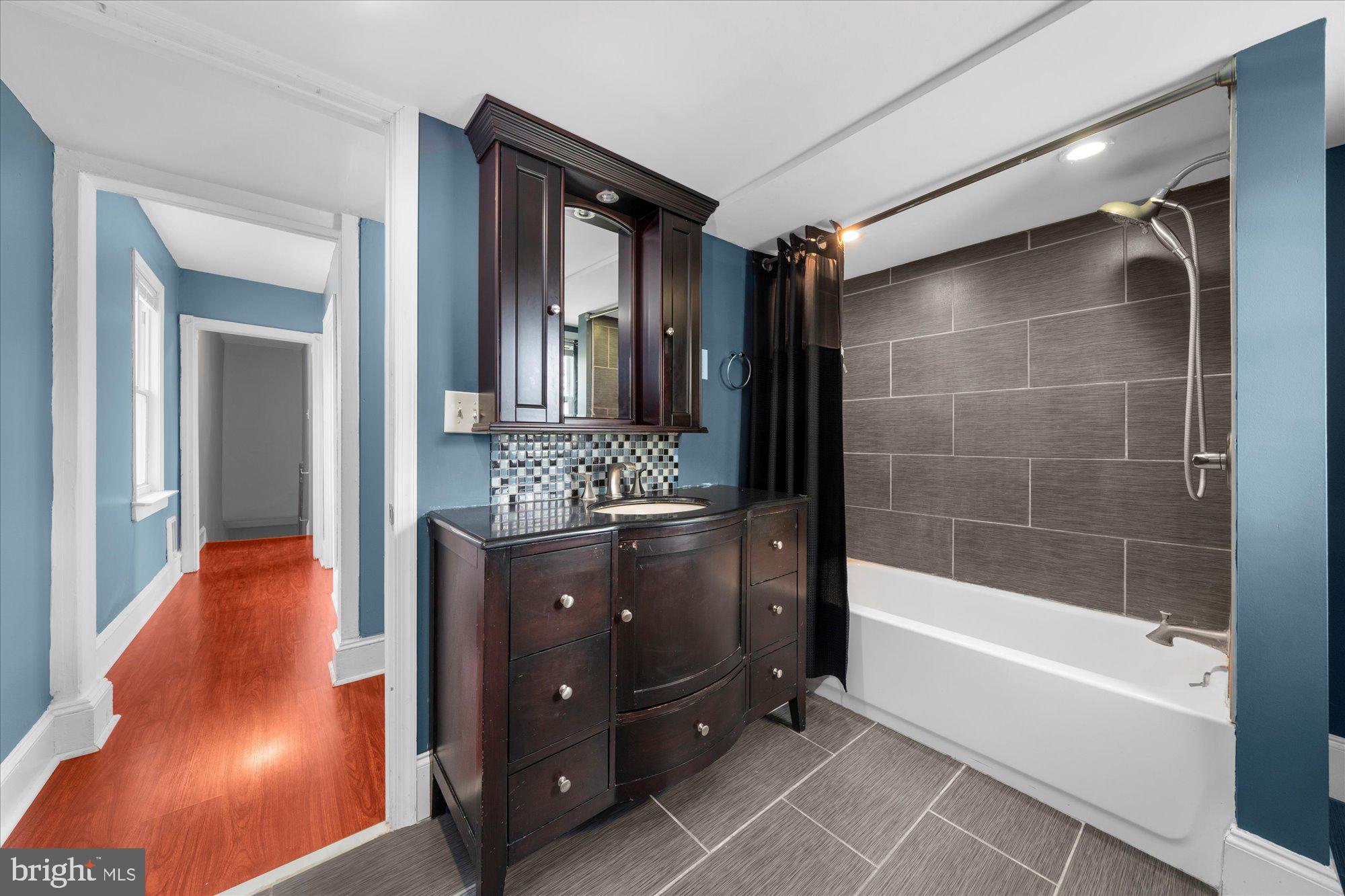 120 Linden Avenue Glenside, PA 19038 - Photo 17 of 28 a bathroom with a tub shower and sink