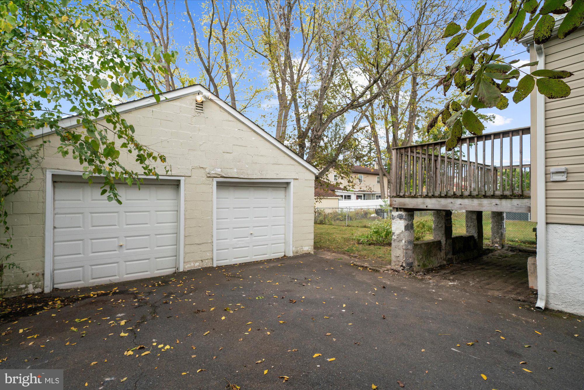 120 Linden Avenue Glenside, PA 19038 - Photo 20 of 28 a view of a house with a backyard and a tree