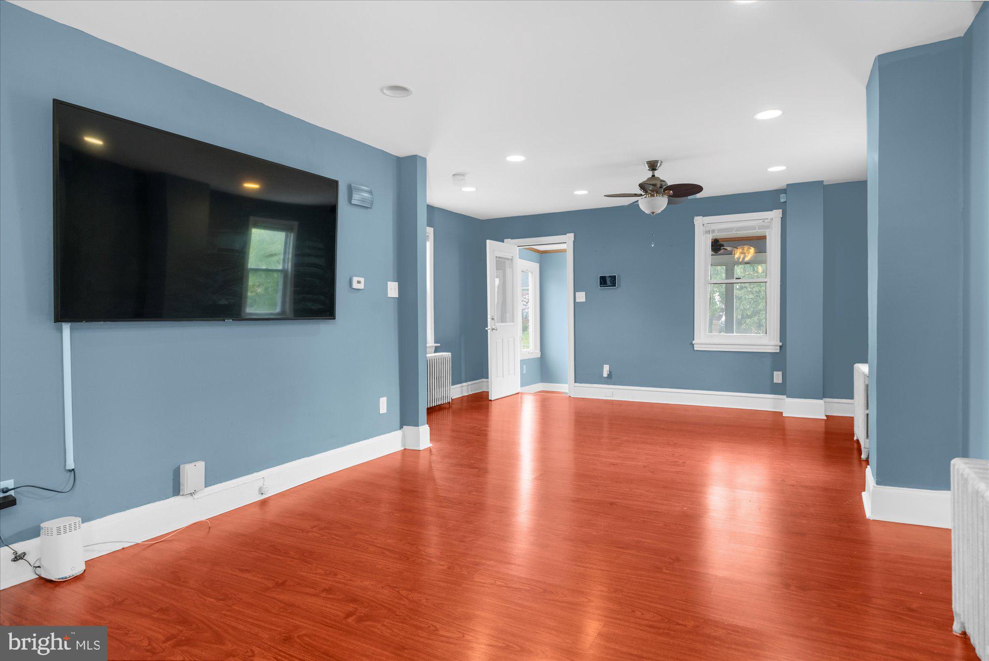 120 Linden Avenue Glenside, PA 19038 - Photo 3 of 28 a view of a livingroom with wooden floor and windows