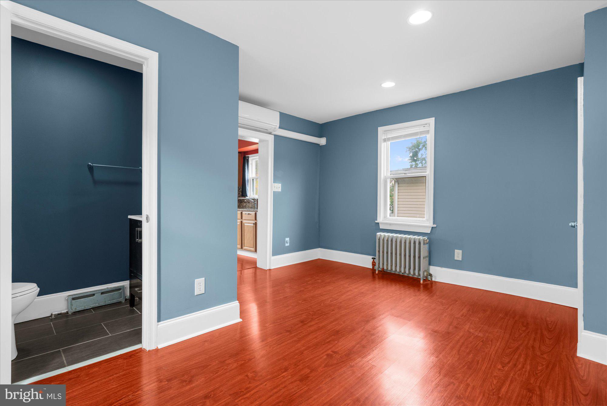 120 Linden Avenue Glenside, PA 19038 - Photo 5 of 28 an empty room with wooden floor and windows