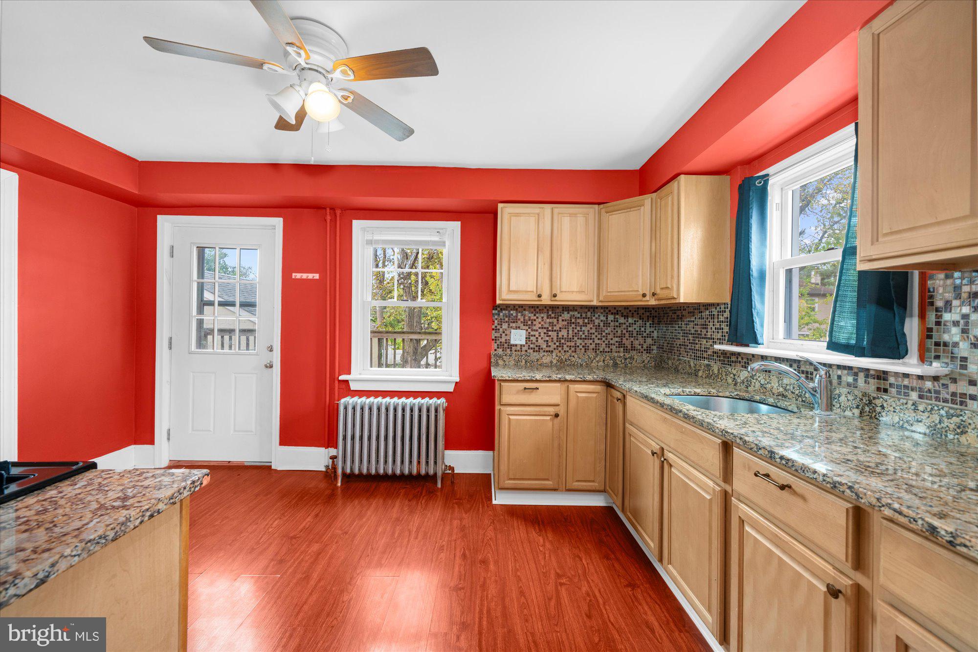 120 Linden Avenue Glenside, PA 19038 - Photo 8 of 28 a kitchen with stainless steel appliances granite countertop a stove a sink and a refrigerator
