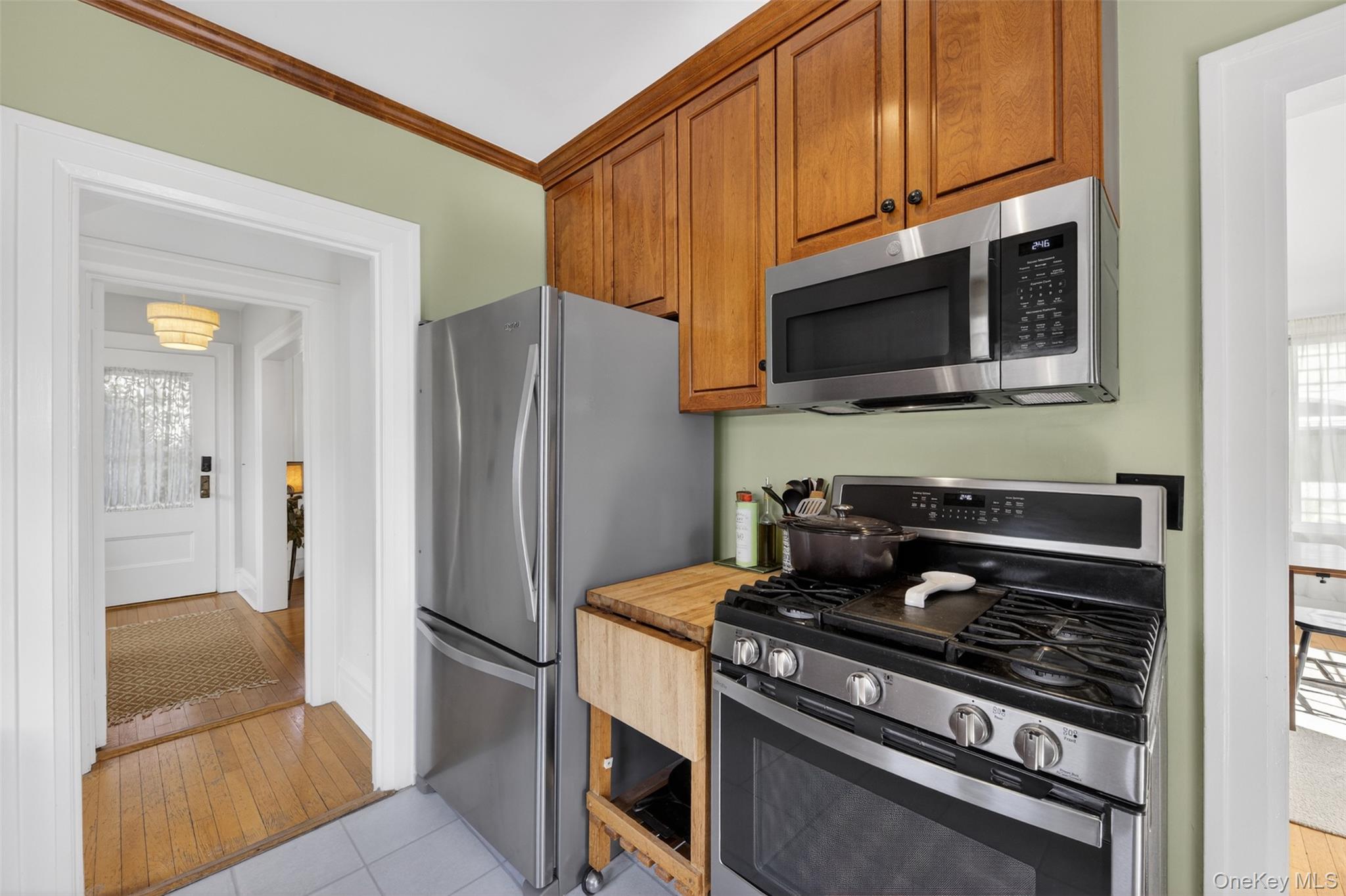 4 Spaulding Place Ossining, NY 10562 - Photo 19 of 43 a kitchen with stainless steel appliances granite countertop a stove microwave and refrigerator