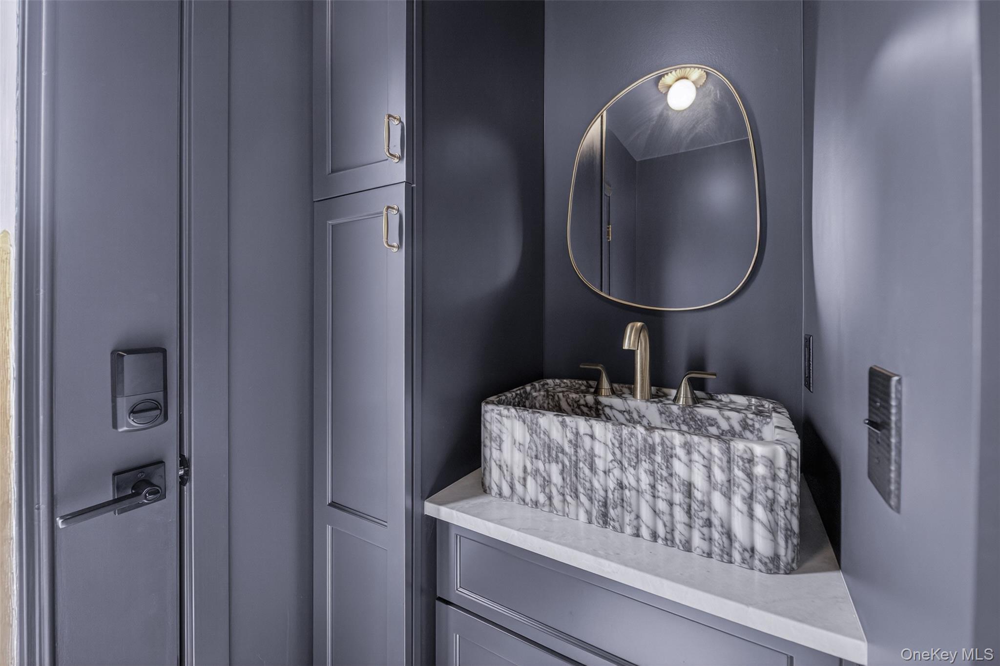 4 Spaulding Place Ossining, NY 10562 - Photo 21 of 43 a bathroom with a sink and a mirror
