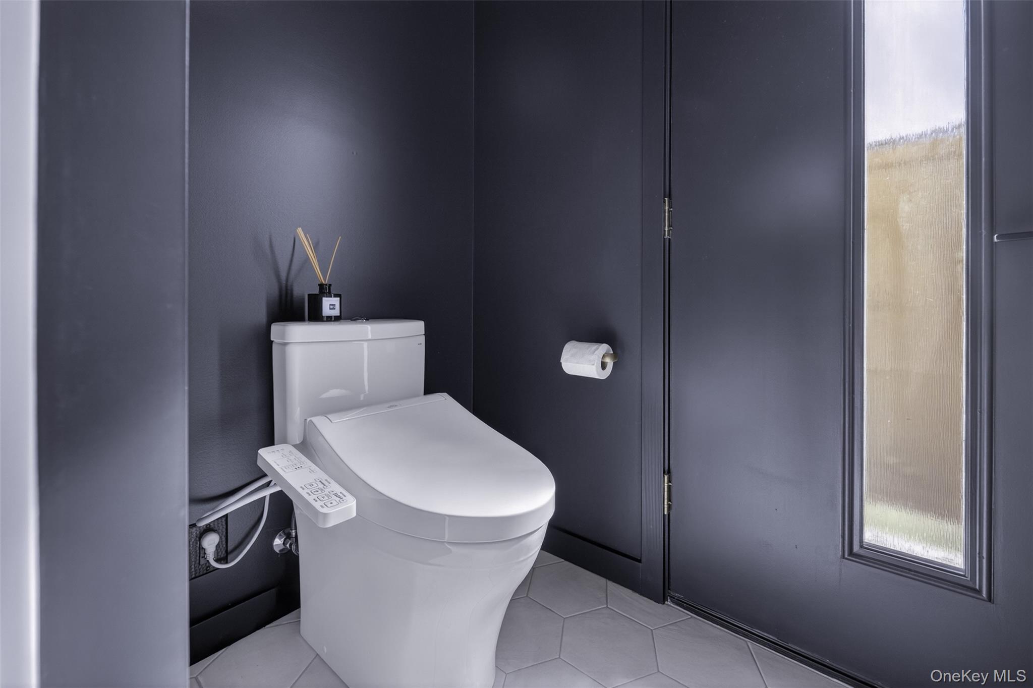 4 Spaulding Place Ossining, NY 10562 - Photo 22 of 43 a bathroom with a toilet and a sink