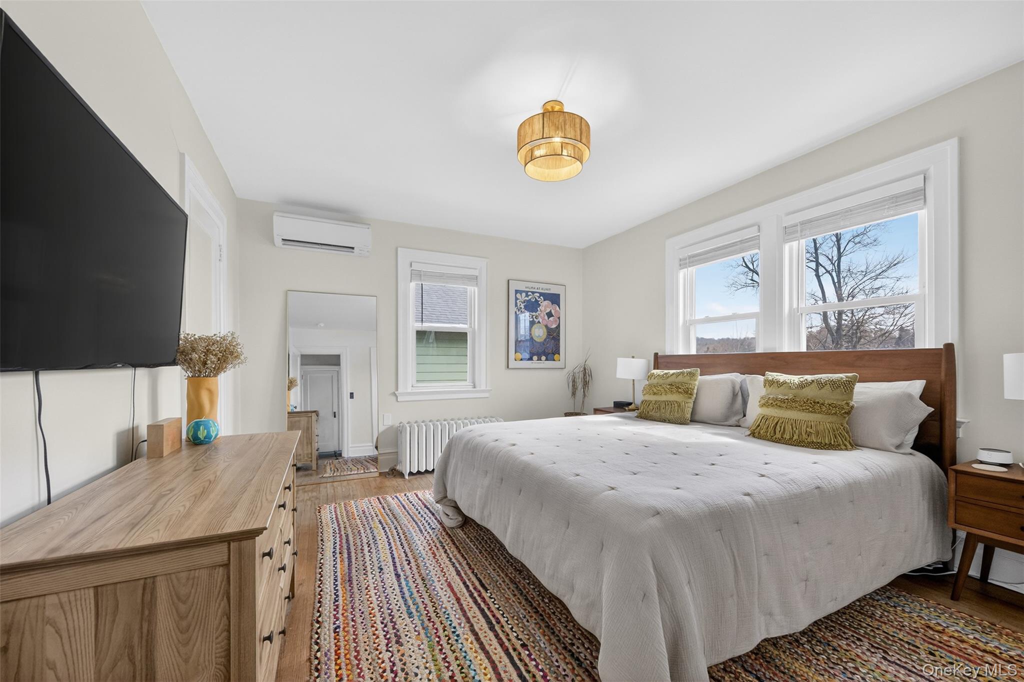 4 Spaulding Place Ossining, NY 10562 - Photo 24 of 43 a bedroom with a bed and a flat screen tv