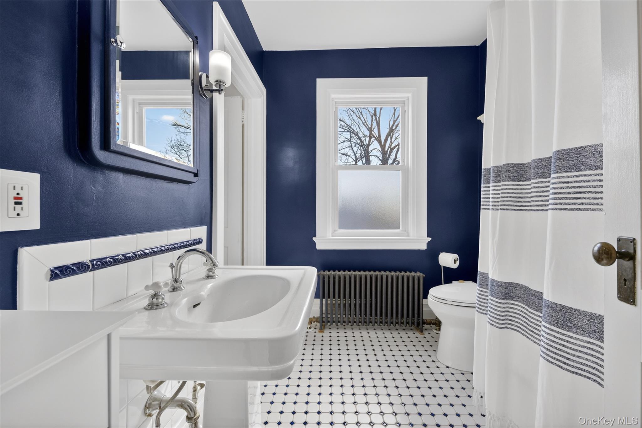4 Spaulding Place Ossining, NY 10562 - Photo 27 of 43 a bathroom with a sink a toilet and shower