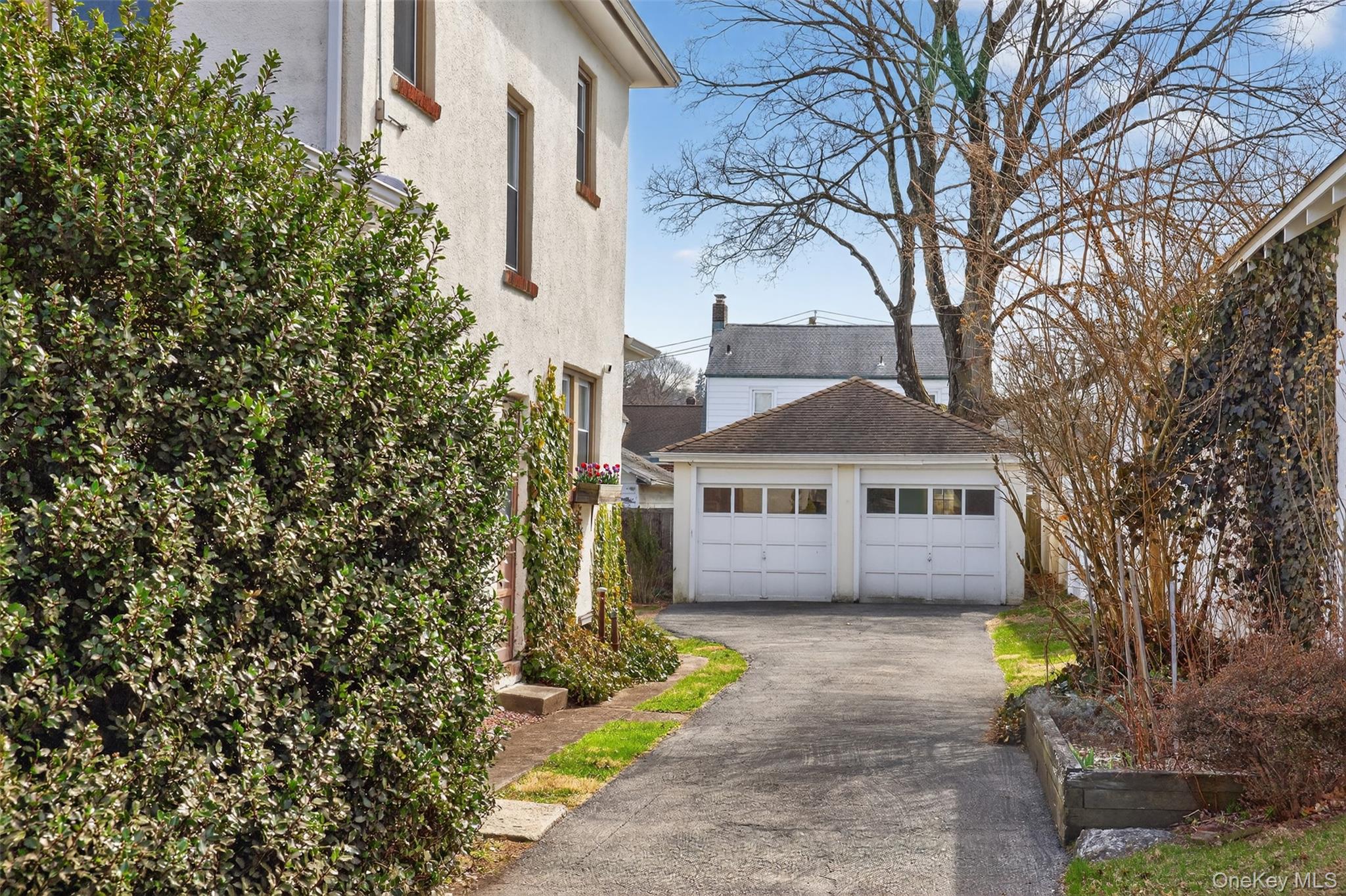 4 Spaulding Place Ossining, NY 10562 - Photo 39 of 43 a view of house with a yard and potted plants