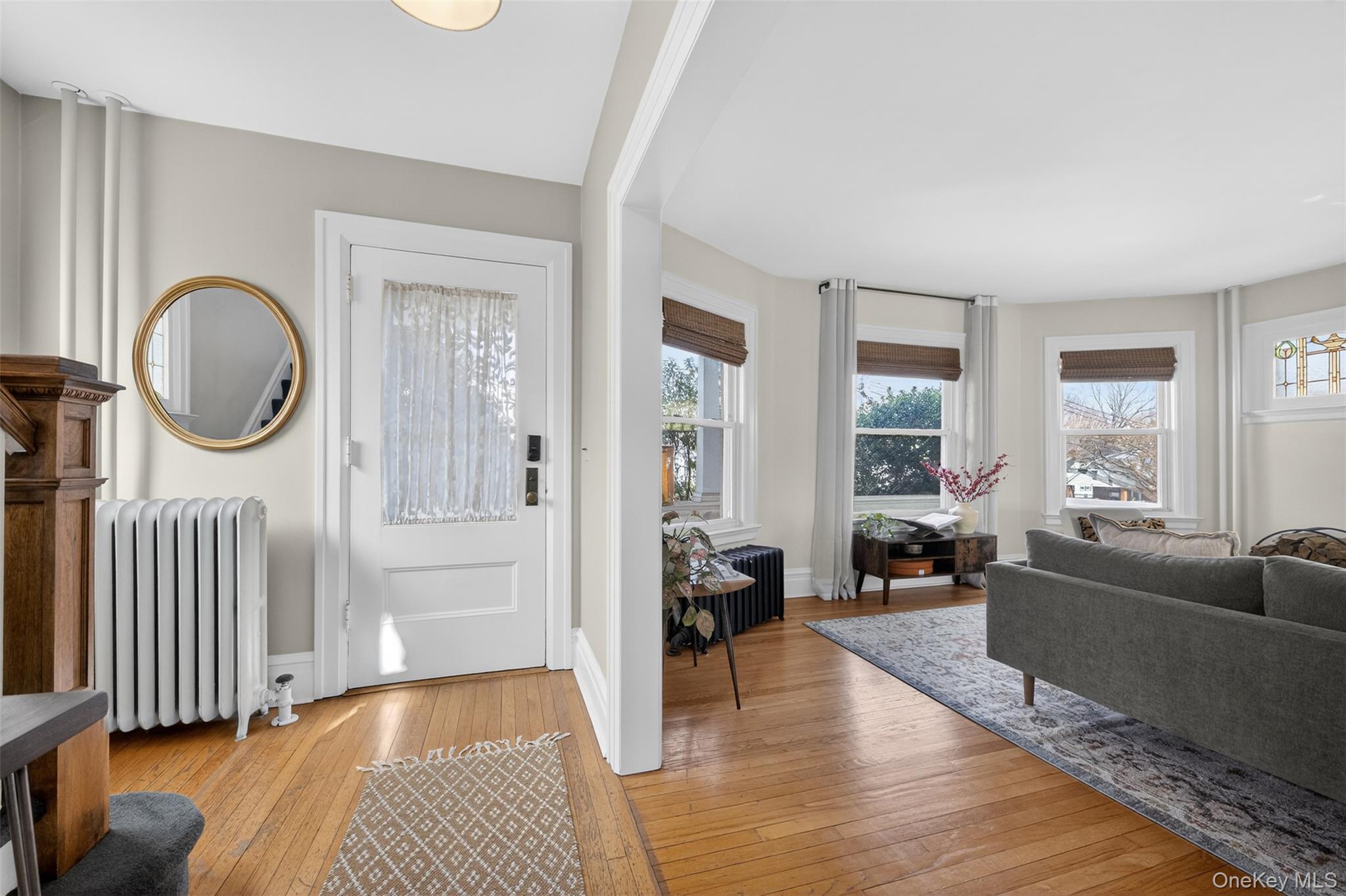 4 Spaulding Place Ossining, NY 10562 - Photo 7 of 43 a living room with furniture and a wooden floor