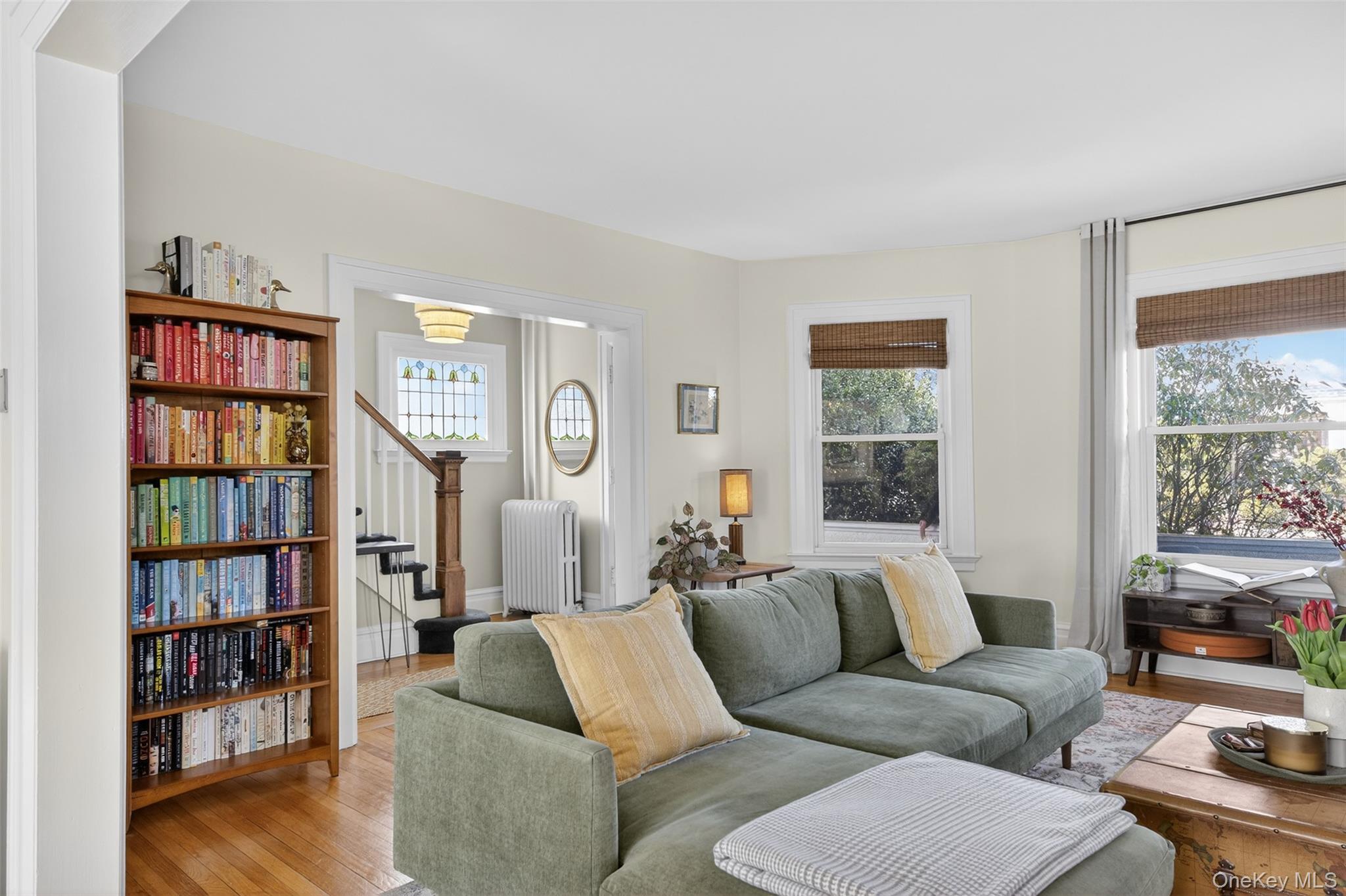 4 Spaulding Place Ossining, NY 10562 - Photo 9 of 43 a living room with furniture and a book shelf
