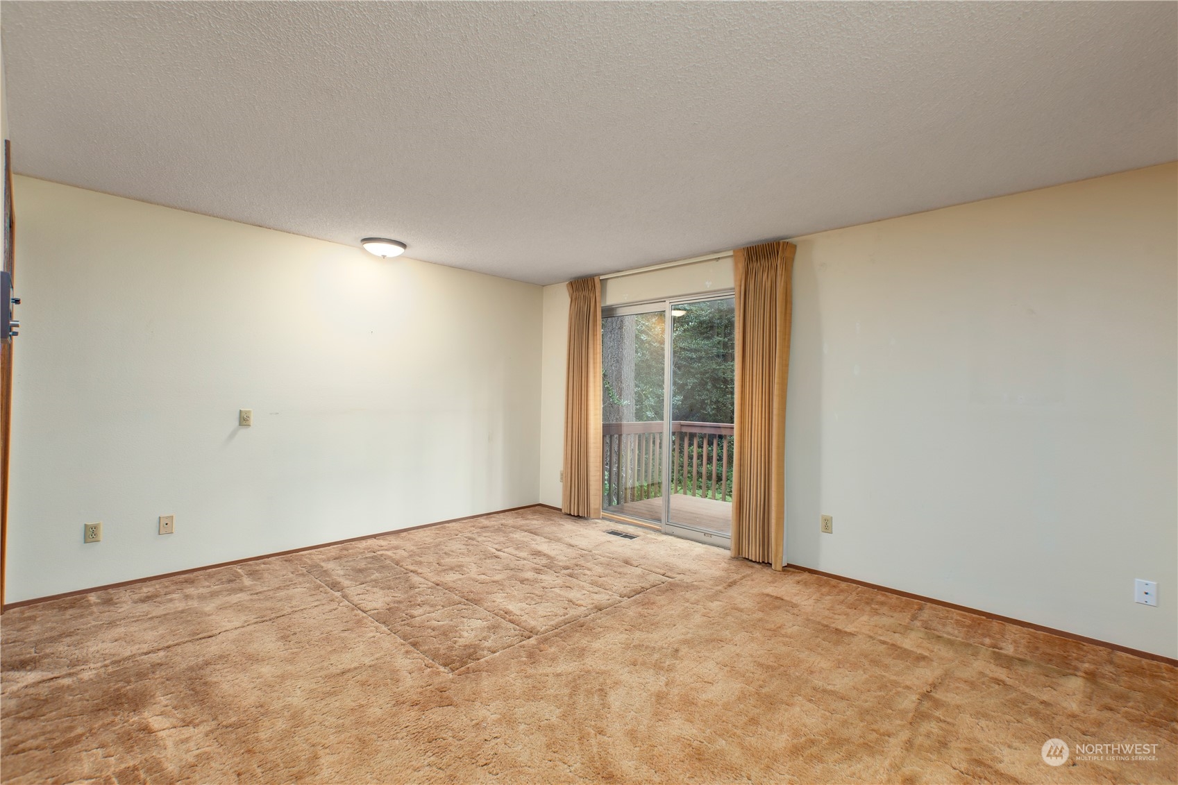 22509 45th Avenue Southeast Bothell, WA 98021 - Photo 17 of 31 a view of an empty room with a window