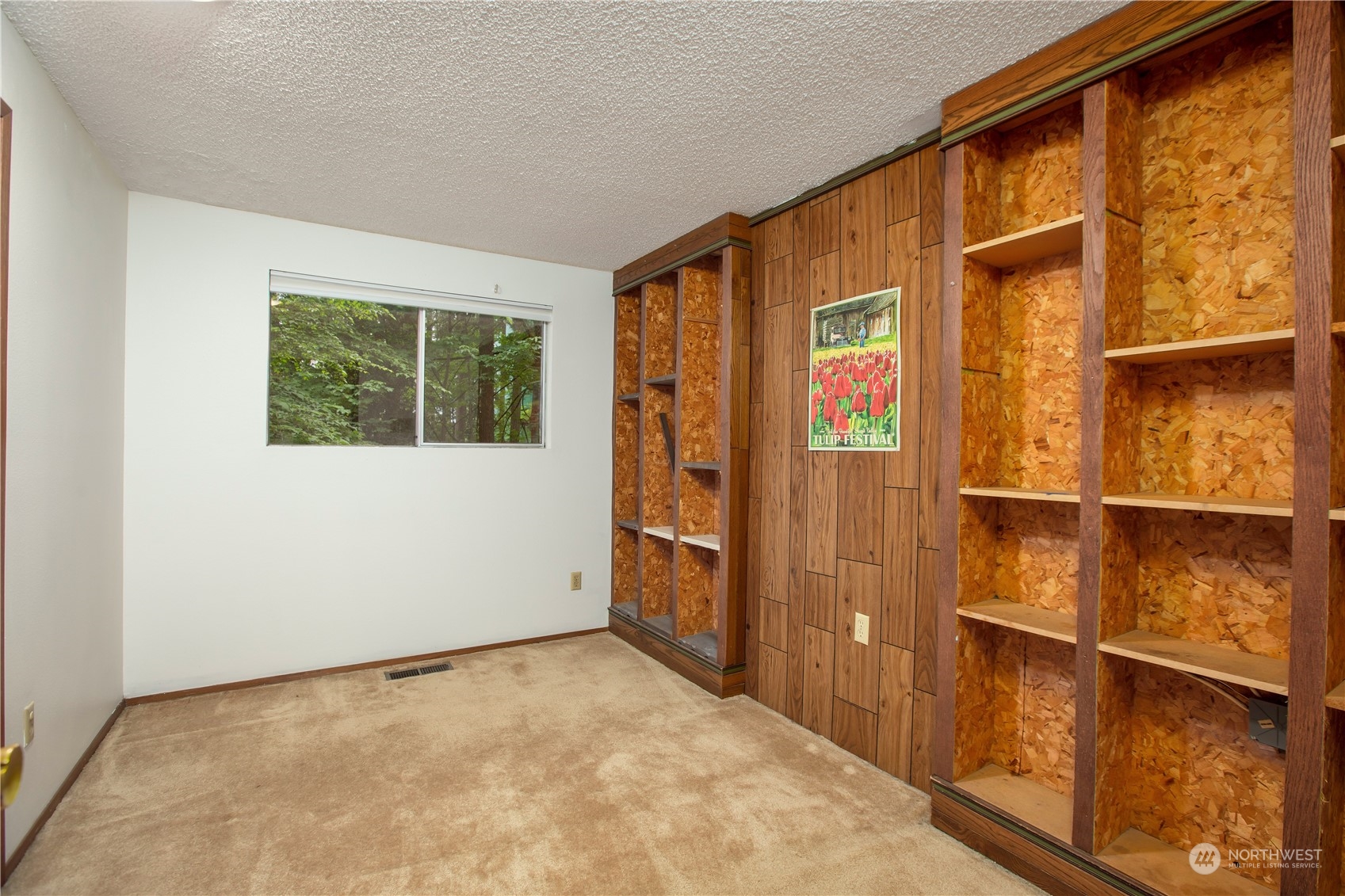 22509 45th Avenue Southeast Bothell, WA 98021 - Photo 21 of 31 a view of an empty room with a window