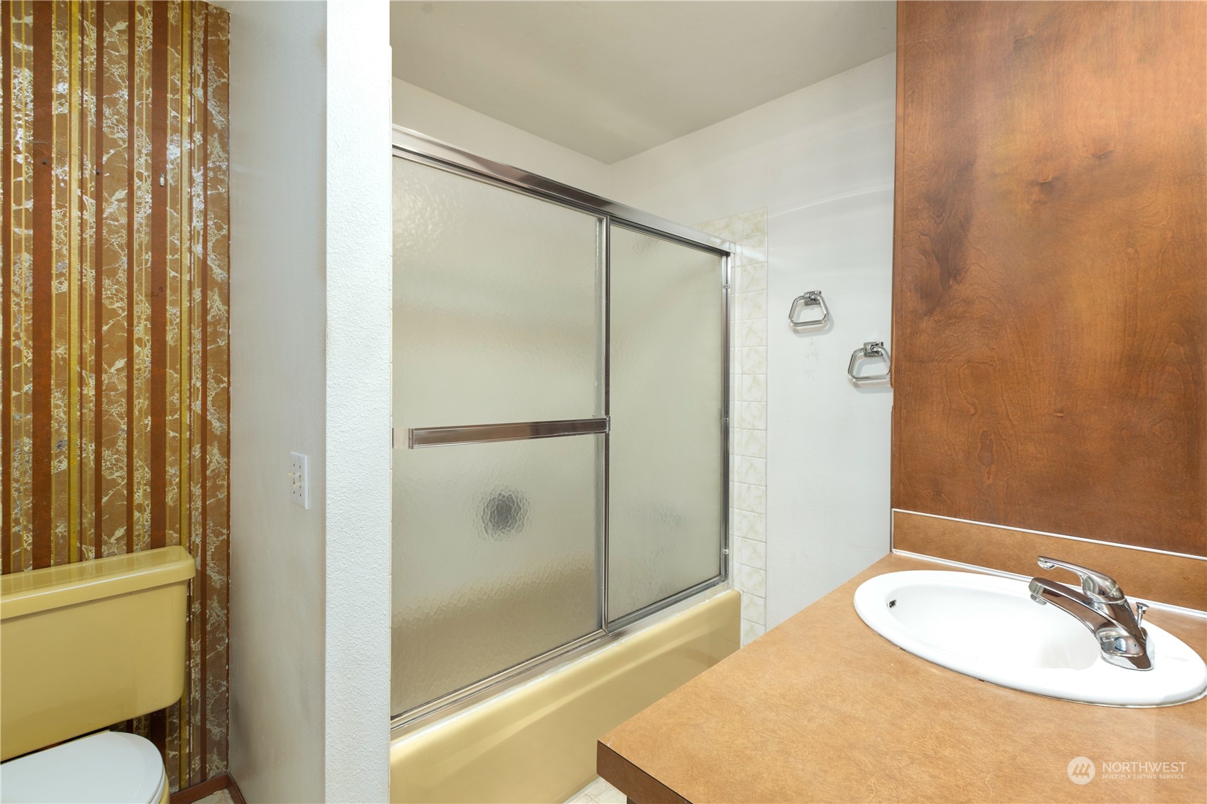 22509 45th Avenue Southeast Bothell, WA 98021 - Photo 22 of 31 a bathroom with a sink and a mirror