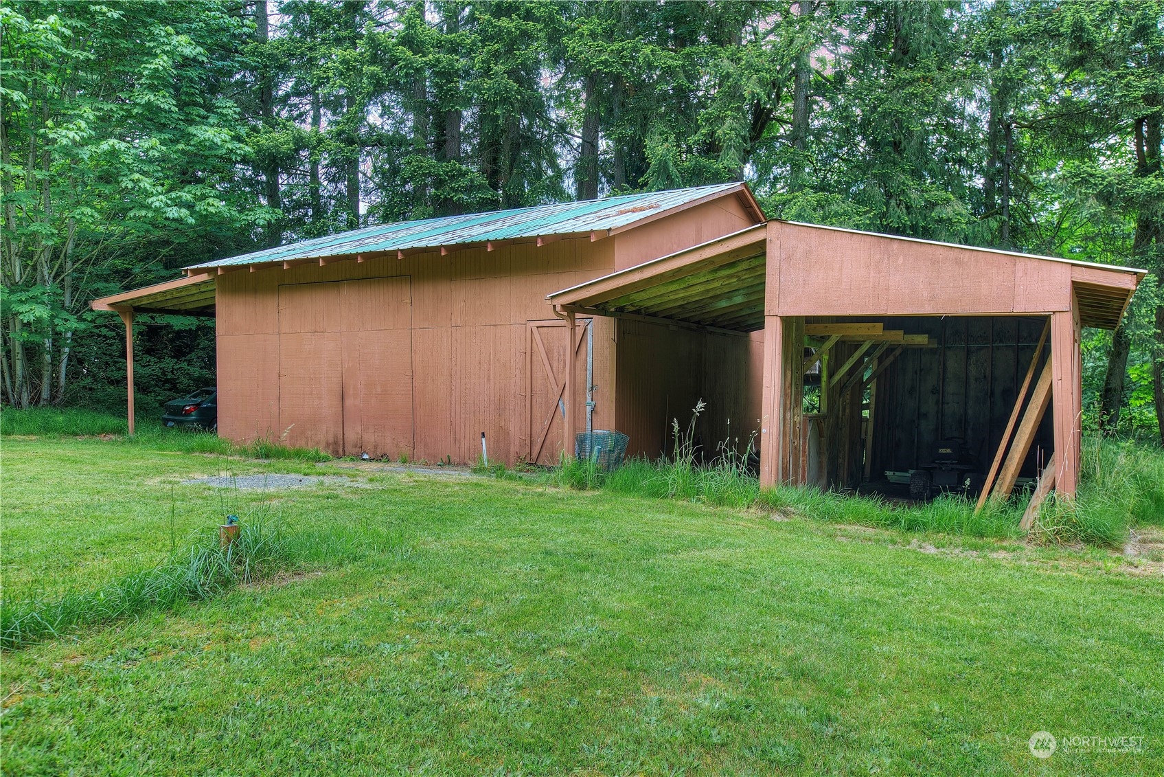 22509 45th Avenue Southeast Bothell, WA 98021 - Photo 25 of 31 a backyard of a house with lots of green space