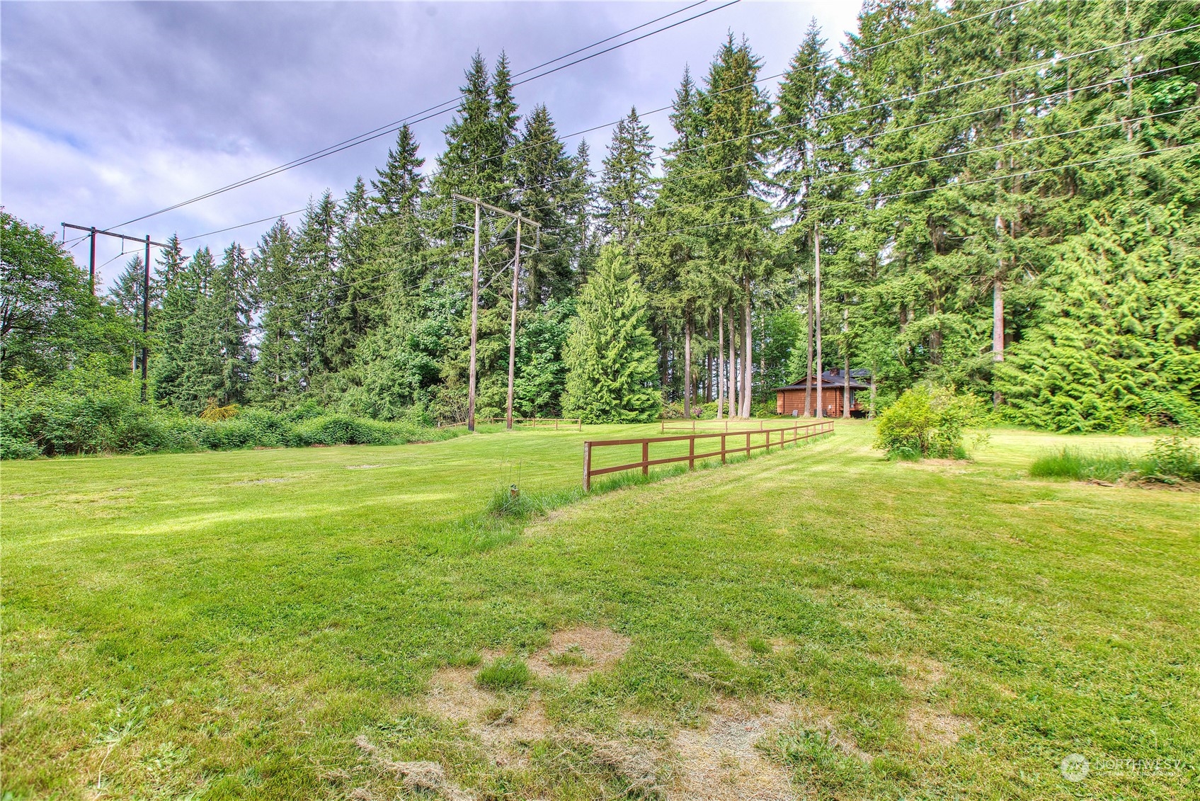 22509 45th Avenue Southeast Bothell, WA 98021 - Photo 29 of 31 a swimming pool with an outdoor space and seating area