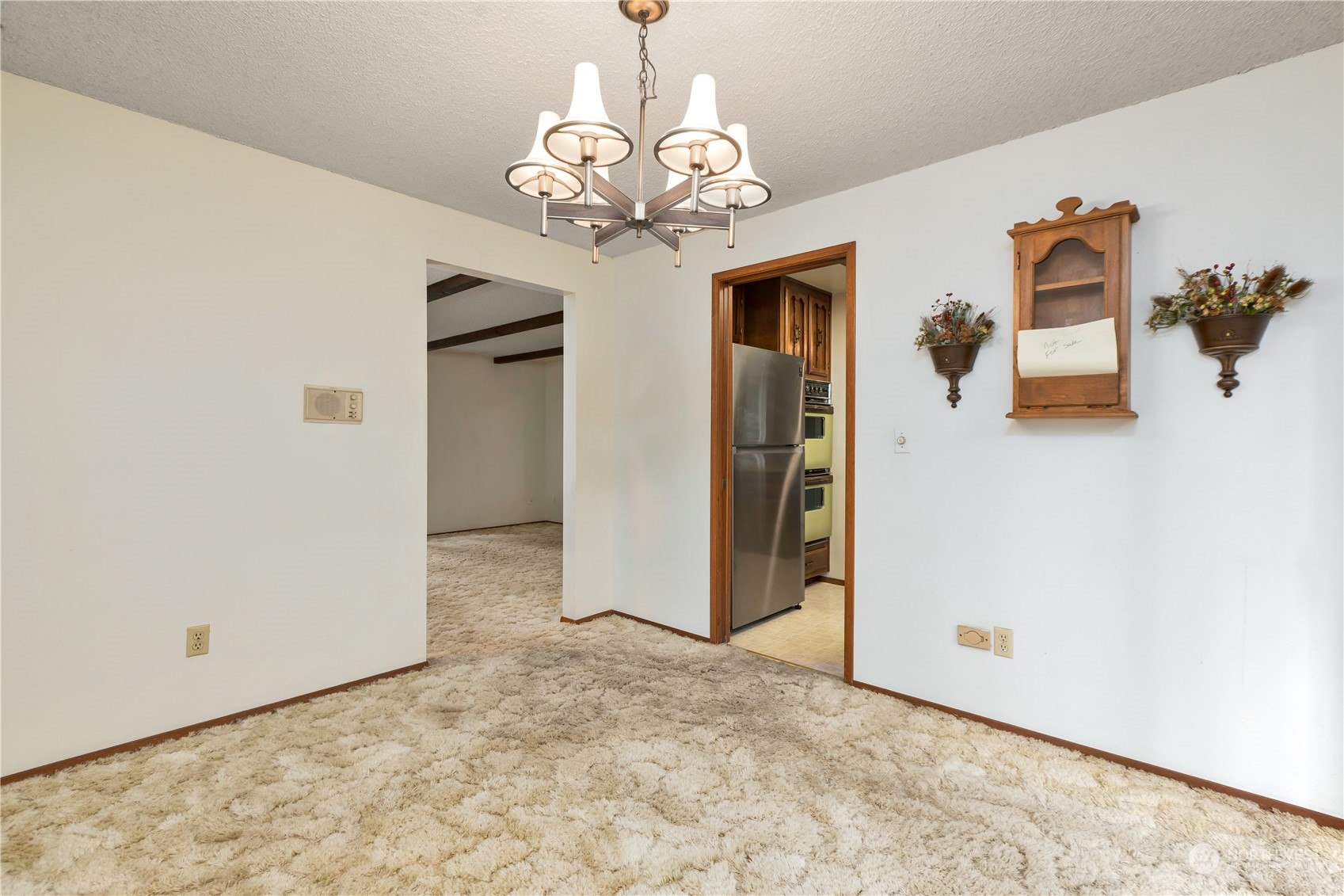 22509 45th Avenue Southeast Bothell, WA 98021 - Photo 7 of 31 a view of a chandelier in a room