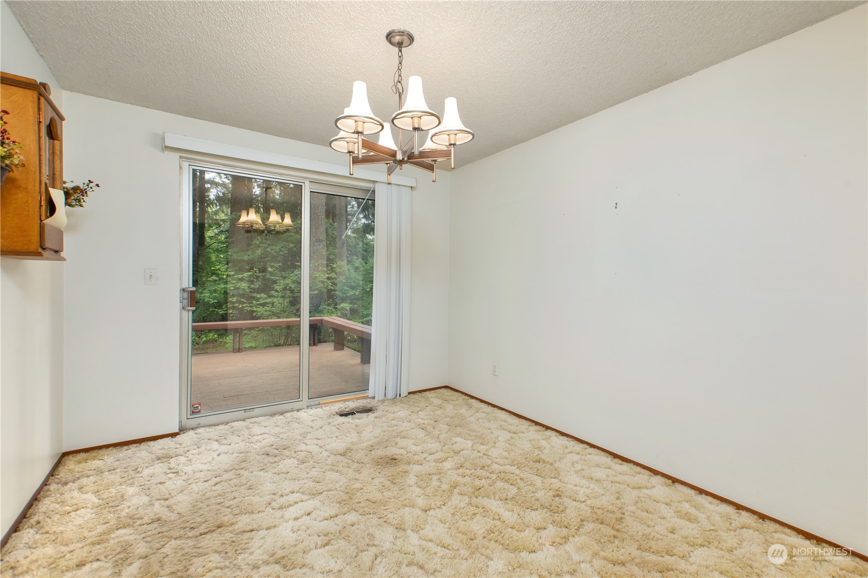 22509 45th Avenue Southeast Bothell, WA 98021 - Photo 8 of 31 a view of an empty room with a window