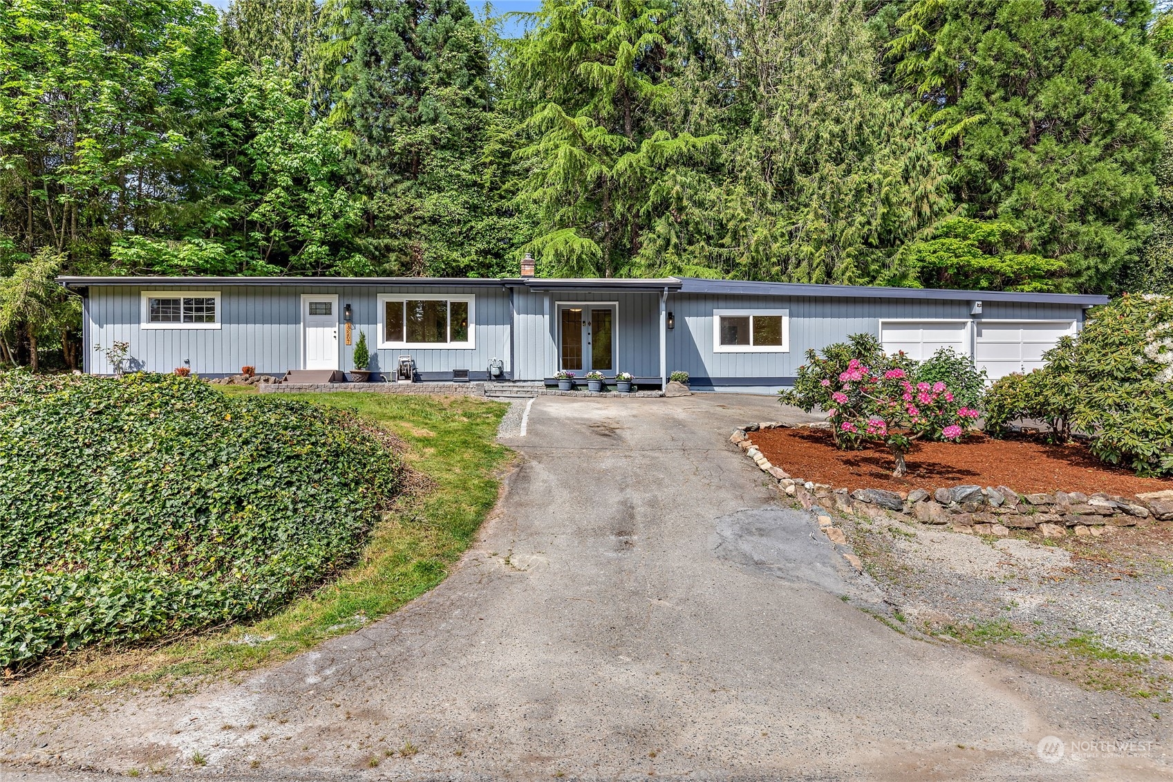 front view of a house with a yard