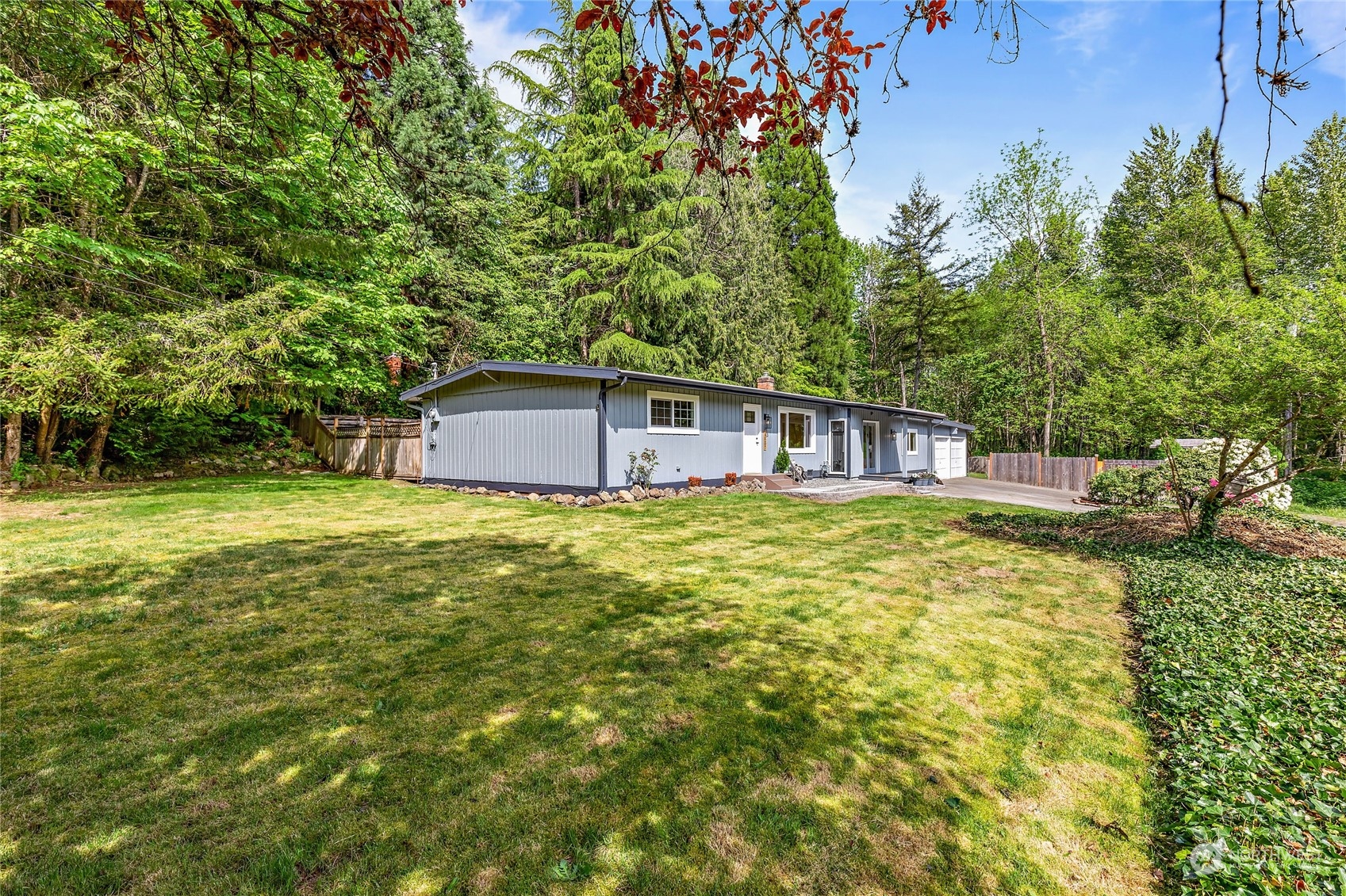 13207 178th Avenue Southeast Renton, WA 98059 - Photo 15 of 15 a front view of a house with a yard