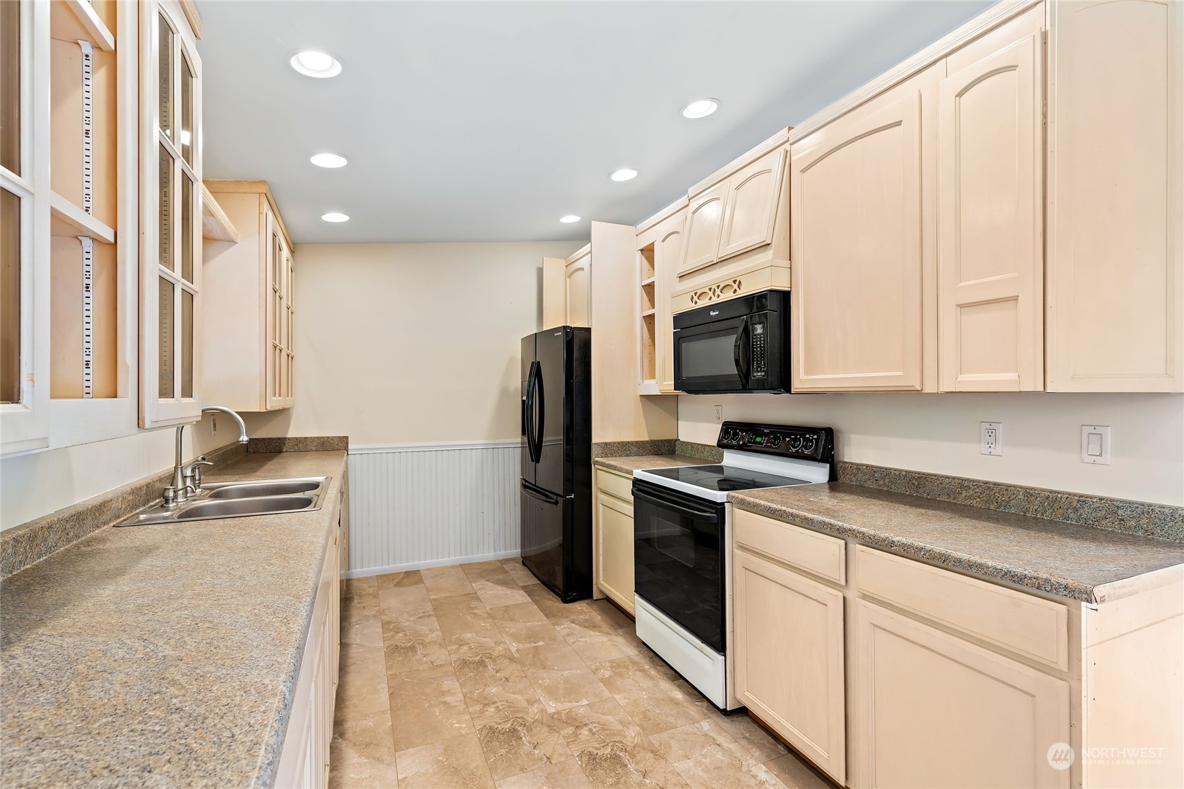 13207 178th Avenue Southeast Renton, WA 98059 - Photo 6 of 15 a kitchen with a sink stove and refrigerator