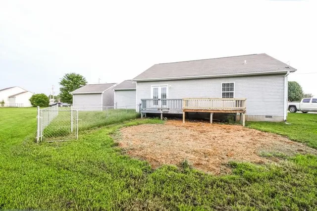 a house view with a backyard space