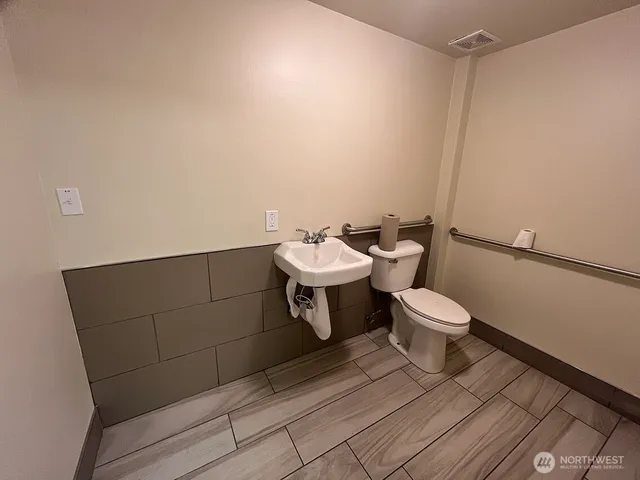 a bathroom with a toilet