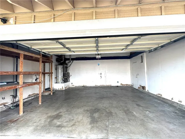 a view of room with a table and chairs