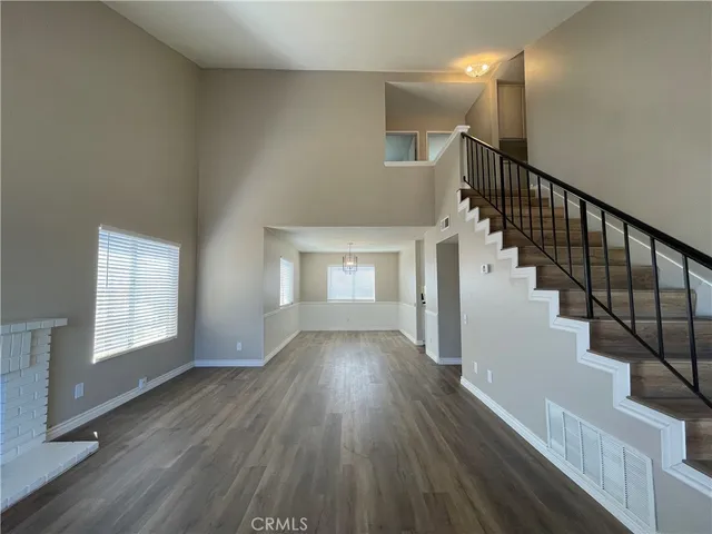 a view of staircase with wooden floor and staircase