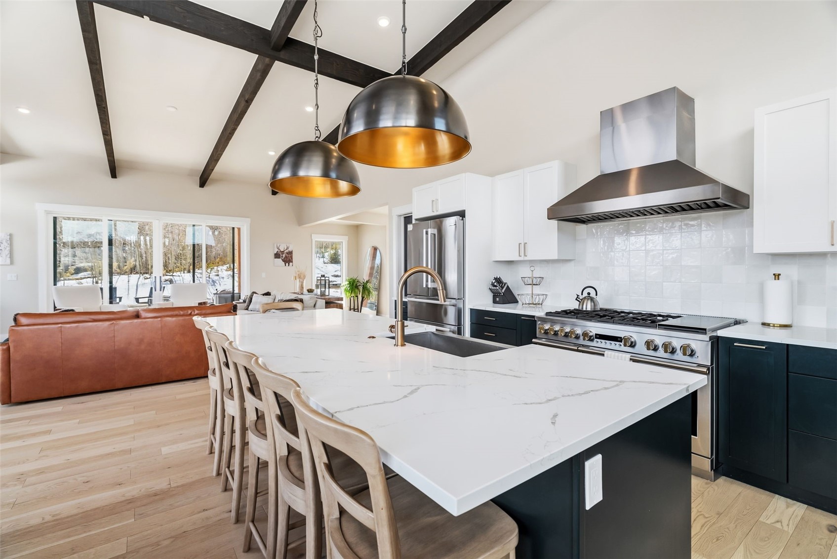 283 McKay Road Silverthorne, CO 80498 - Photo 11 of 47 Open-concept kitchen with large island and modern finishes.