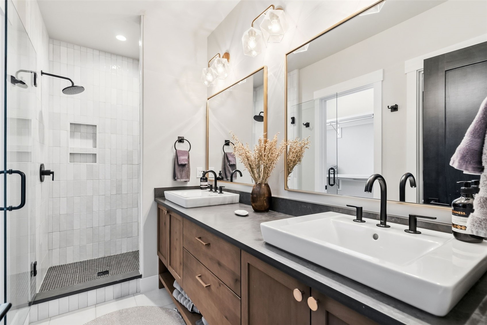 283 McKay Road Silverthorne, CO 80498 - Photo 18 of 47 Bathroom with double sinks and glass shower