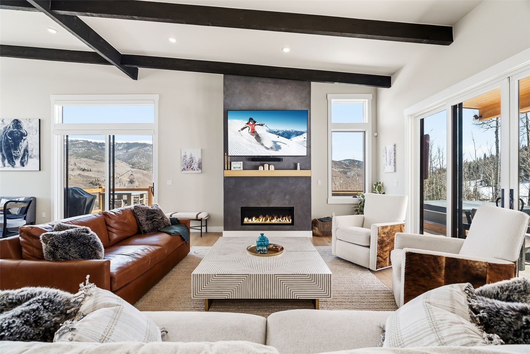 283 McKay Road Silverthorne, CO 80498 - Photo 5 of 47 Bright living room with large windows and views toward National Forest.