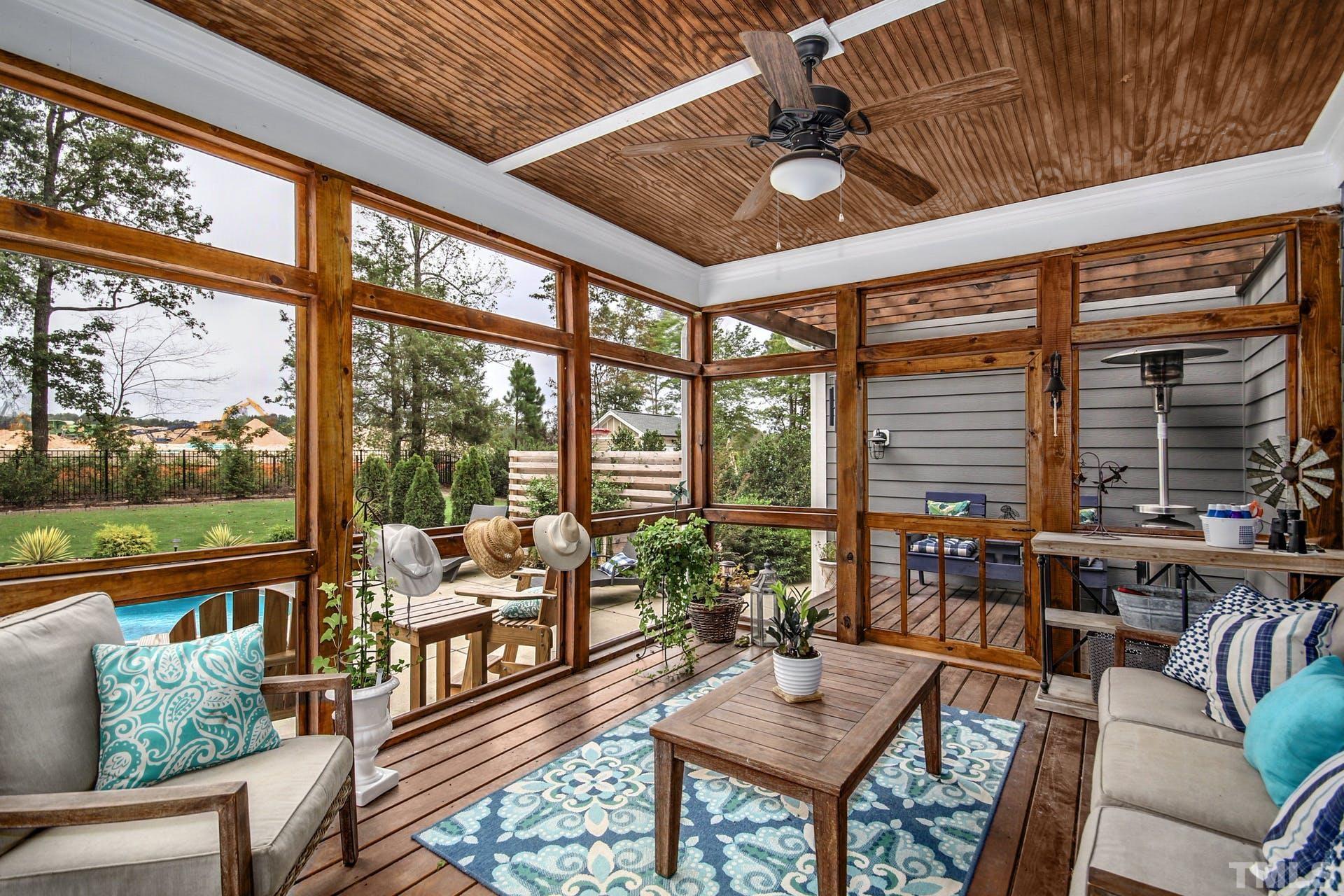 948 Flash Drive Rolesville, NC 27571 - Photo 14 of 30 a living room with furniture and floor to ceiling windows