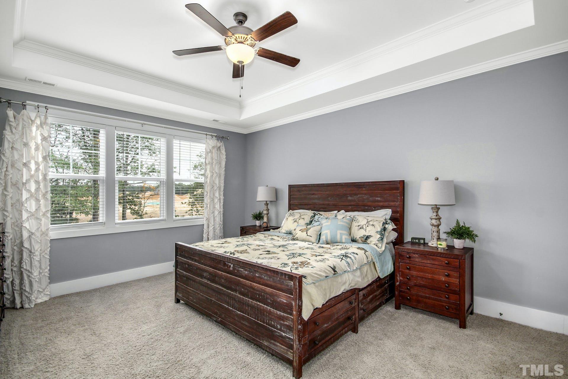 948 Flash Drive Rolesville, NC 27571 - Photo 20 of 30 a bedroom with a bed and a large window