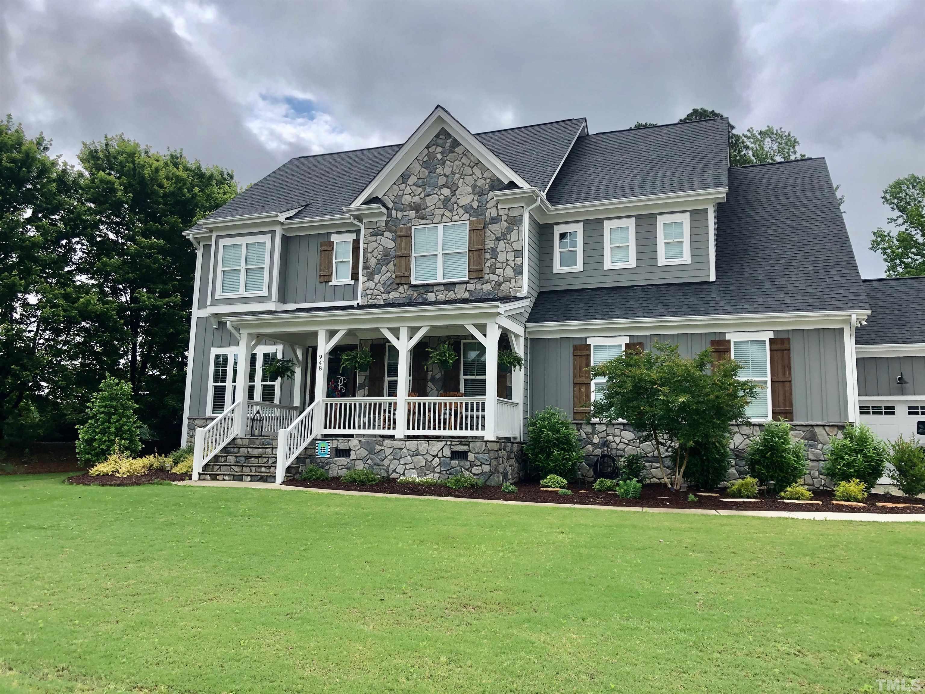 948 Flash Drive Rolesville, NC 27571 - Photo 3 of 30 a front view of a house with a yard