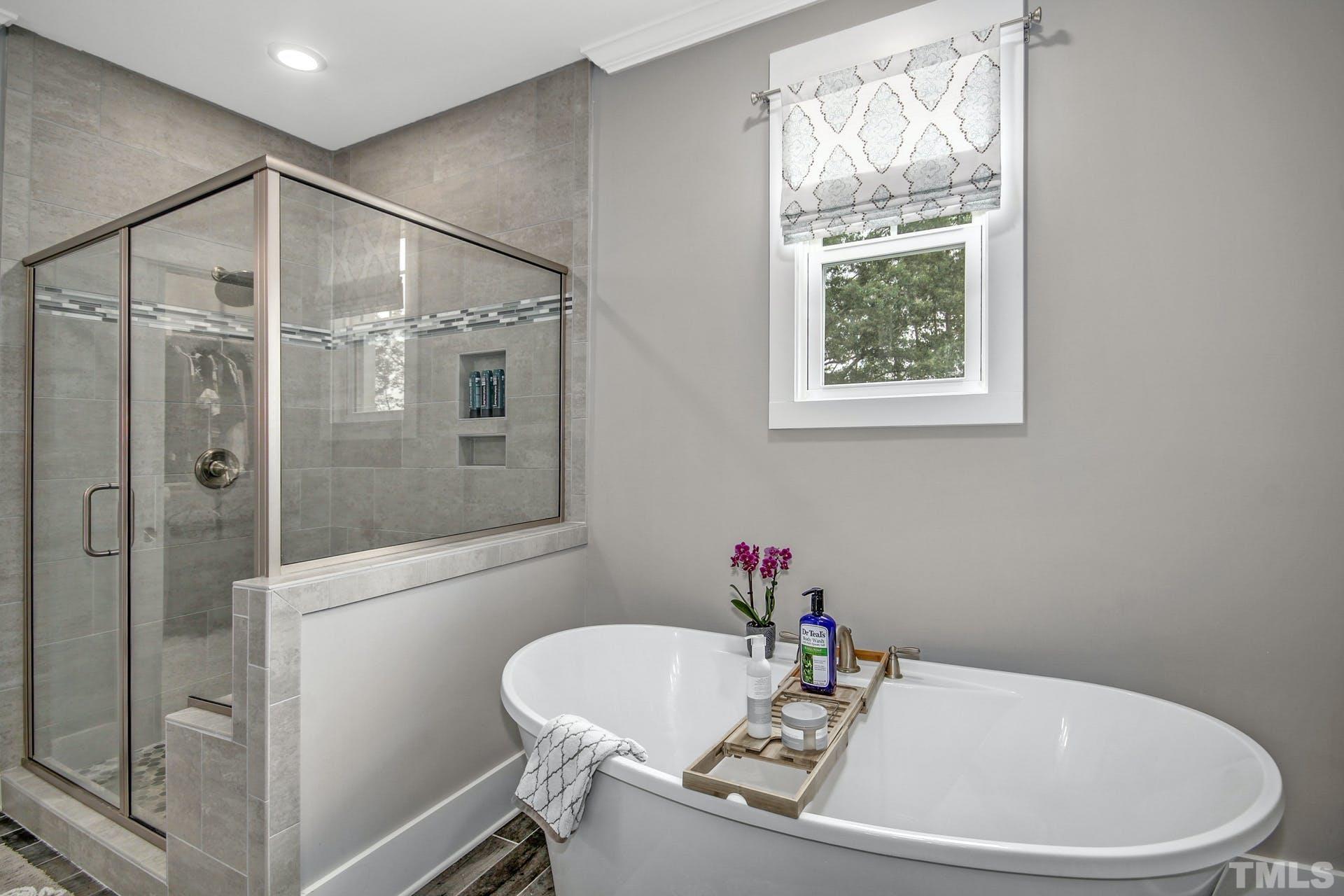 948 Flash Drive Rolesville, NC 27571 - Photo 24 of 30 a bathroom with a sink and a shower