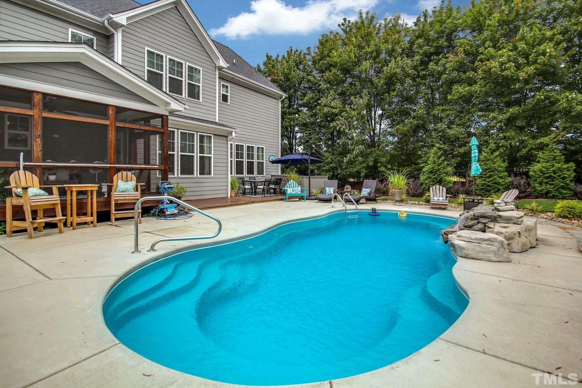 948 Flash Drive Rolesville, NC 27571 - Photo 27 of 30 a view of a swimming pool with a patio