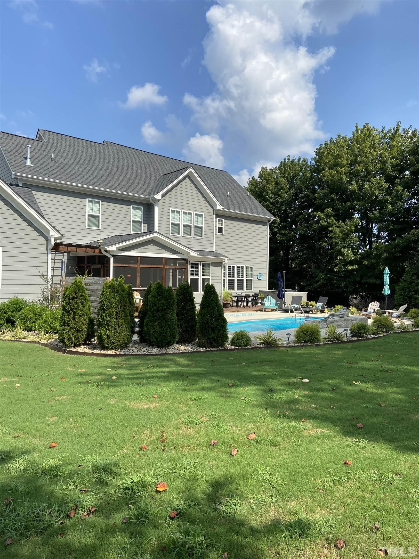 948 Flash Drive Rolesville, NC 27571 - Photo 9 of 30 a front view of house with a garden