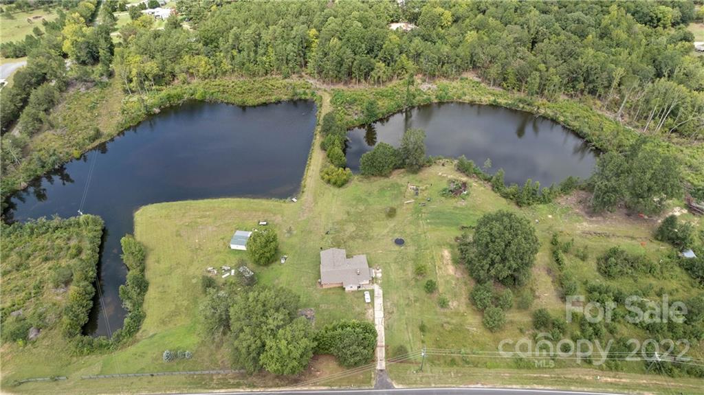 825 Sutton Spring Road York, SC 29745 - Photo 1 of 8 an aerial view of a house