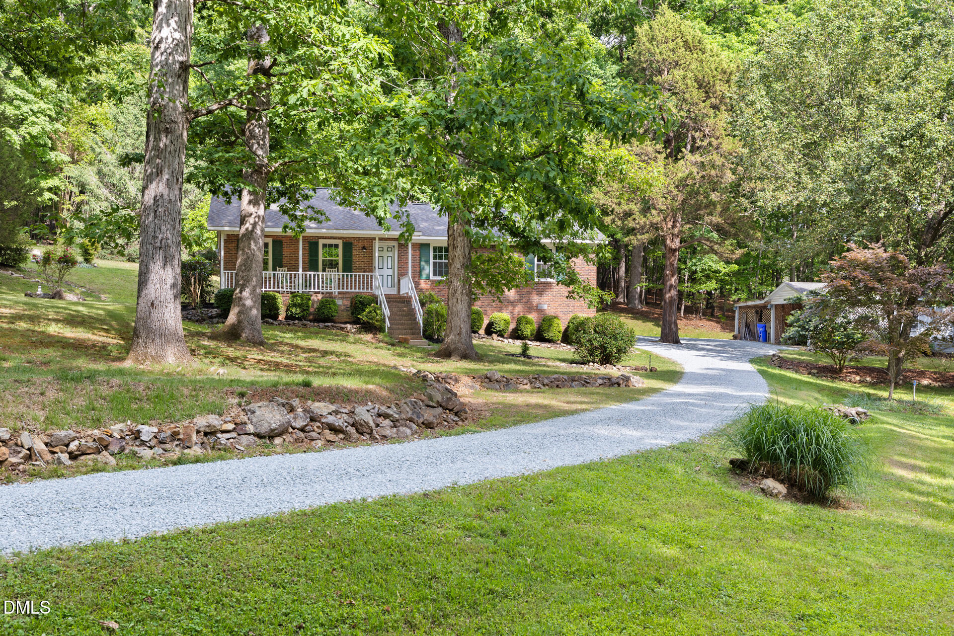 1322 Palmers Grove Church Road Hillsborough, NC 27278 - Photo 1 of 36 a front view of a house with a yard