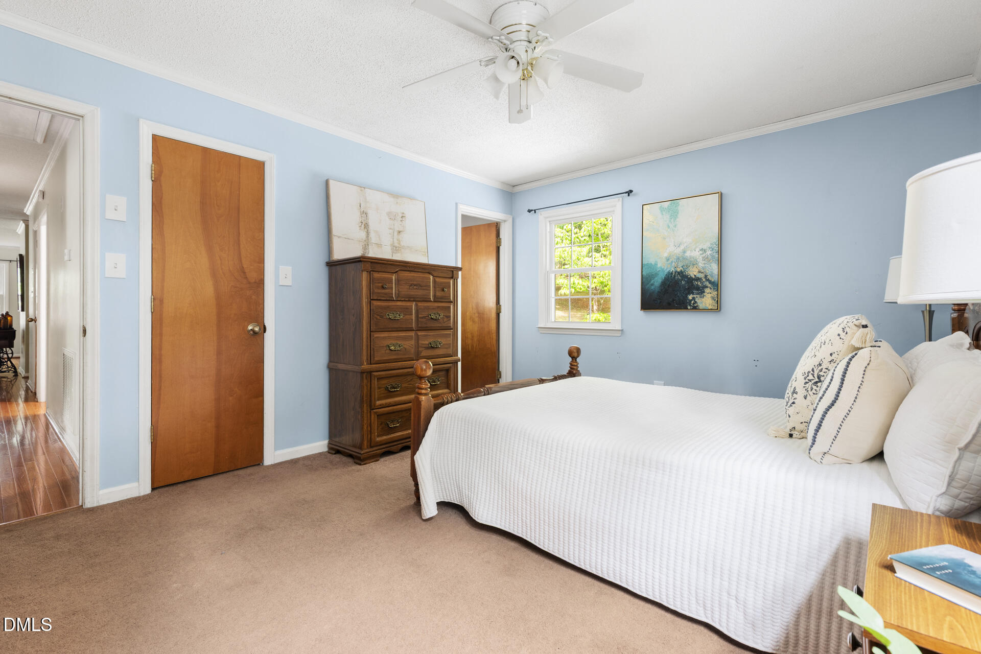 1322 Palmers Grove Church Road Hillsborough, NC 27278 - Photo 19 of 36 a bedroom with a bed and wooden floor