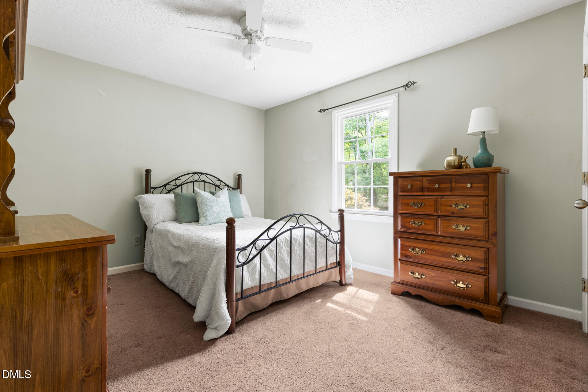 1322 Palmers Grove Church Road Hillsborough, NC 27278 - Photo 23 of 36 a bedroom with a bed and a dresser