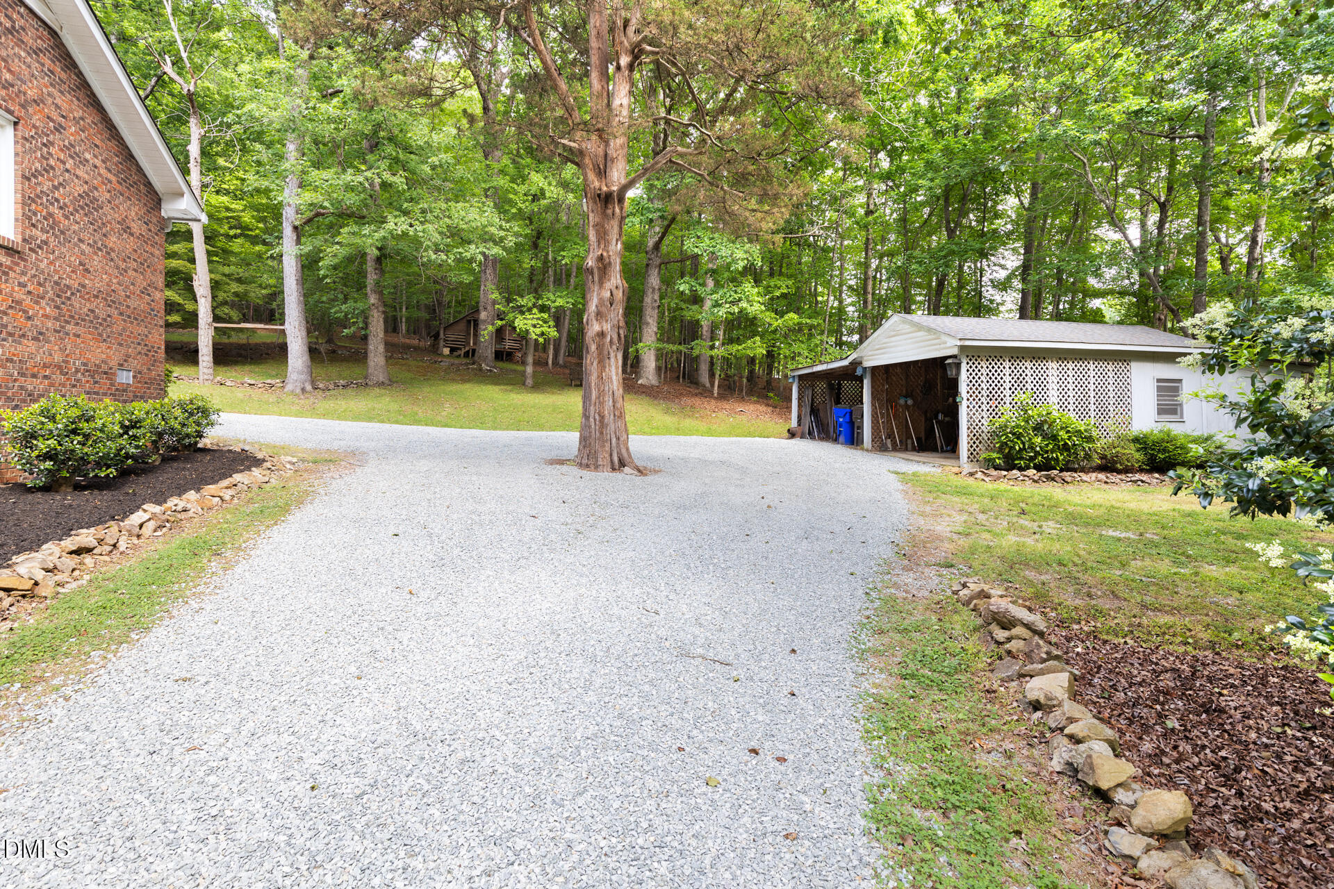 1322 Palmers Grove Church Road Hillsborough, NC 27278 - Photo 31 of 36 a view of house with backyard and glass windows