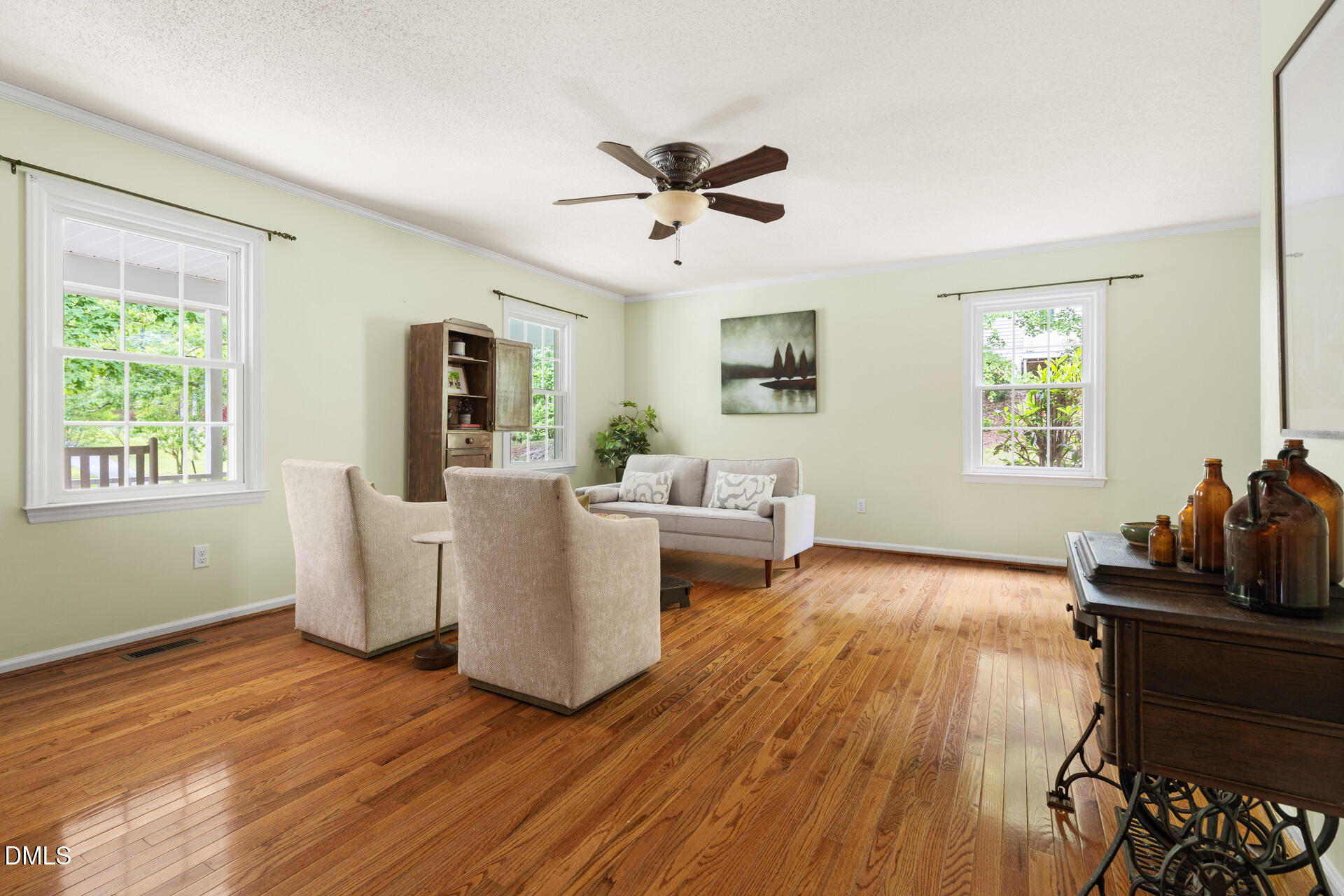 1322 Palmers Grove Church Road Hillsborough, NC 27278 - Photo 7 of 36 a living room with furniture and a wooden floor