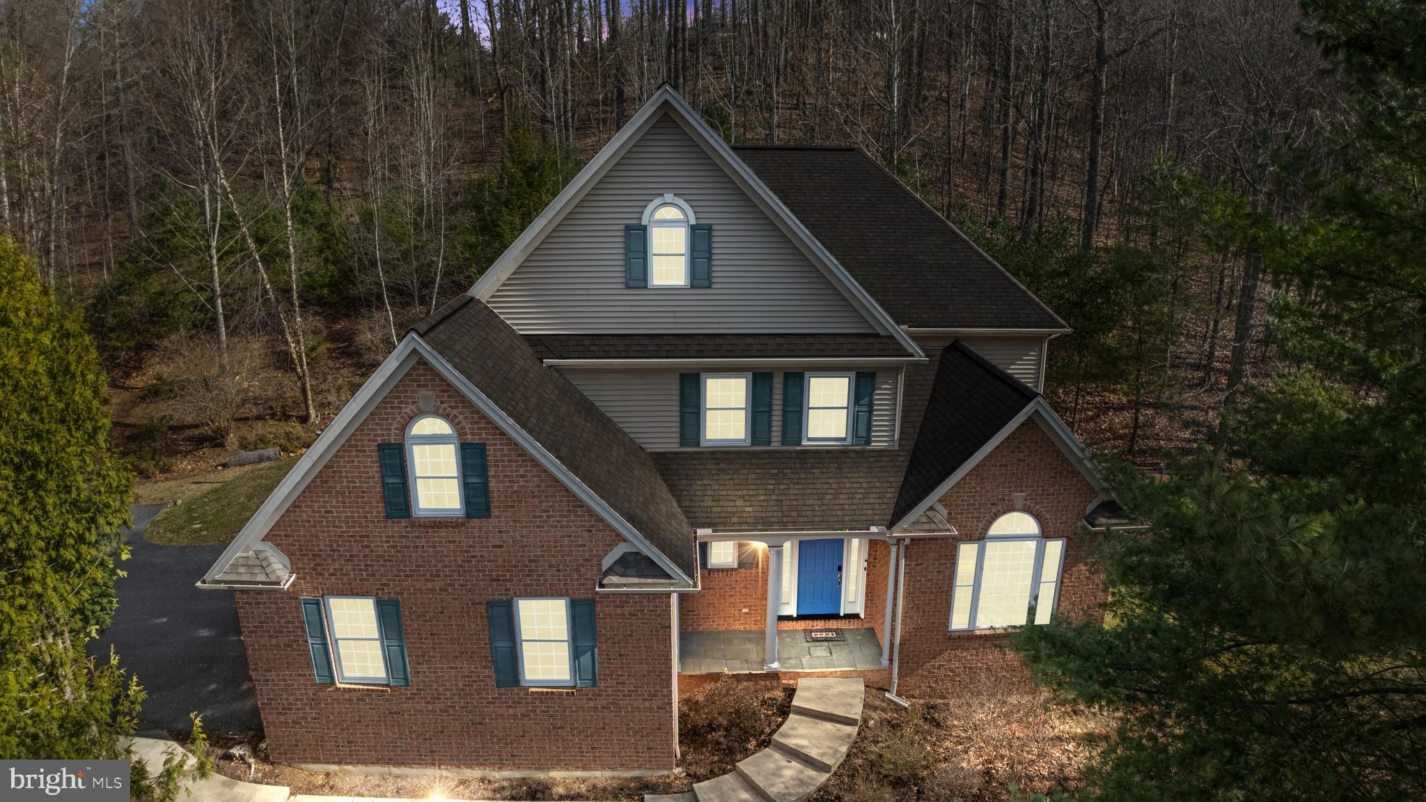 190 Michael Road Port Matilda, PA 16870 - Photo 2 of 59 a front view of a house with a yard