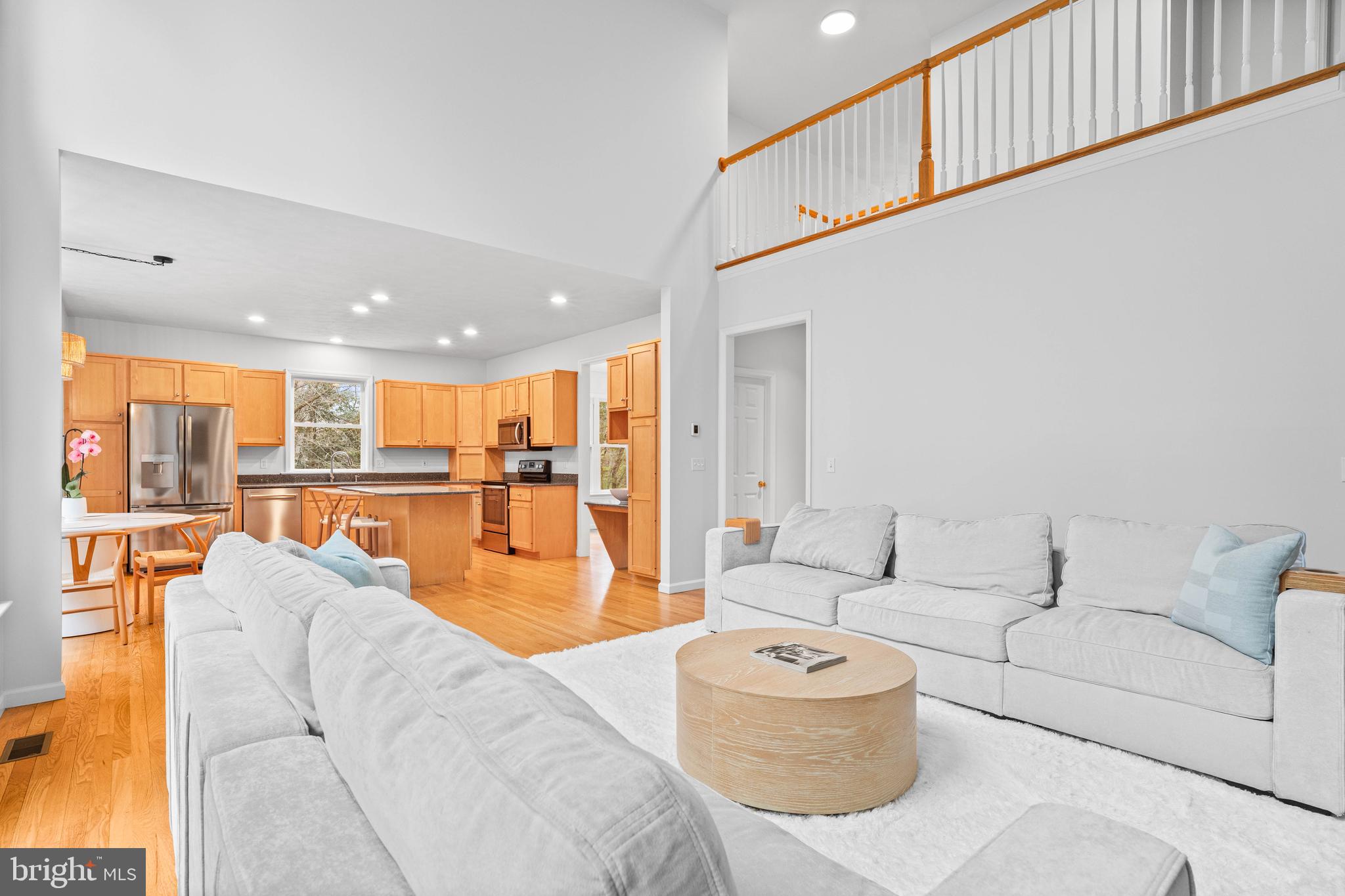 190 Michael Road Port Matilda, PA 16870 - Photo 22 of 59 a living room with furniture and kitchen view with wooden floor
