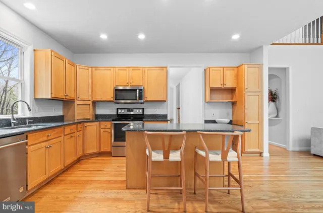 a view of a hallway with windows