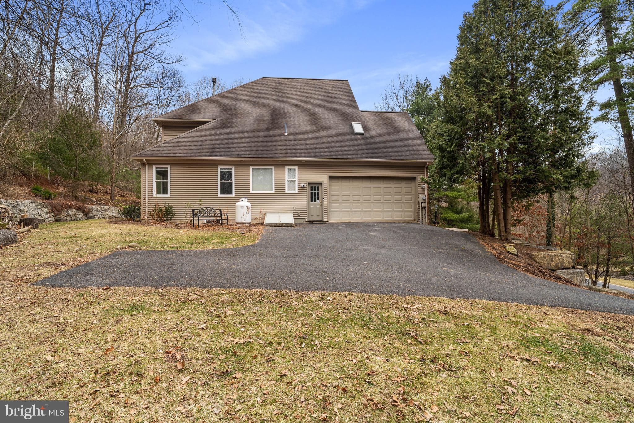 190 Michael Road Port Matilda, PA 16870 - Photo 51 of 59 a front view of house with yard and trees around